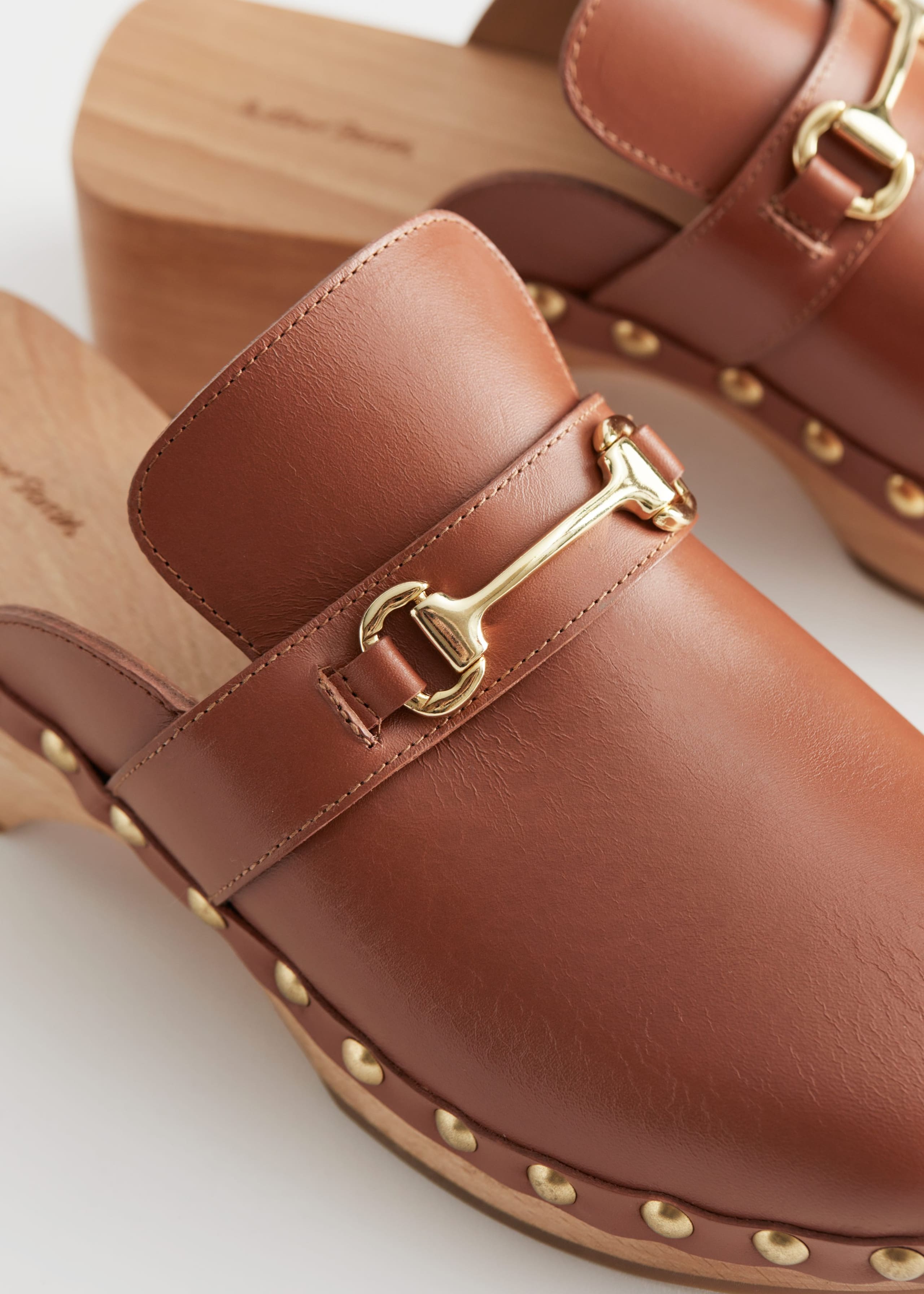 Image of StuddedLeatherWoodenDecoClogs