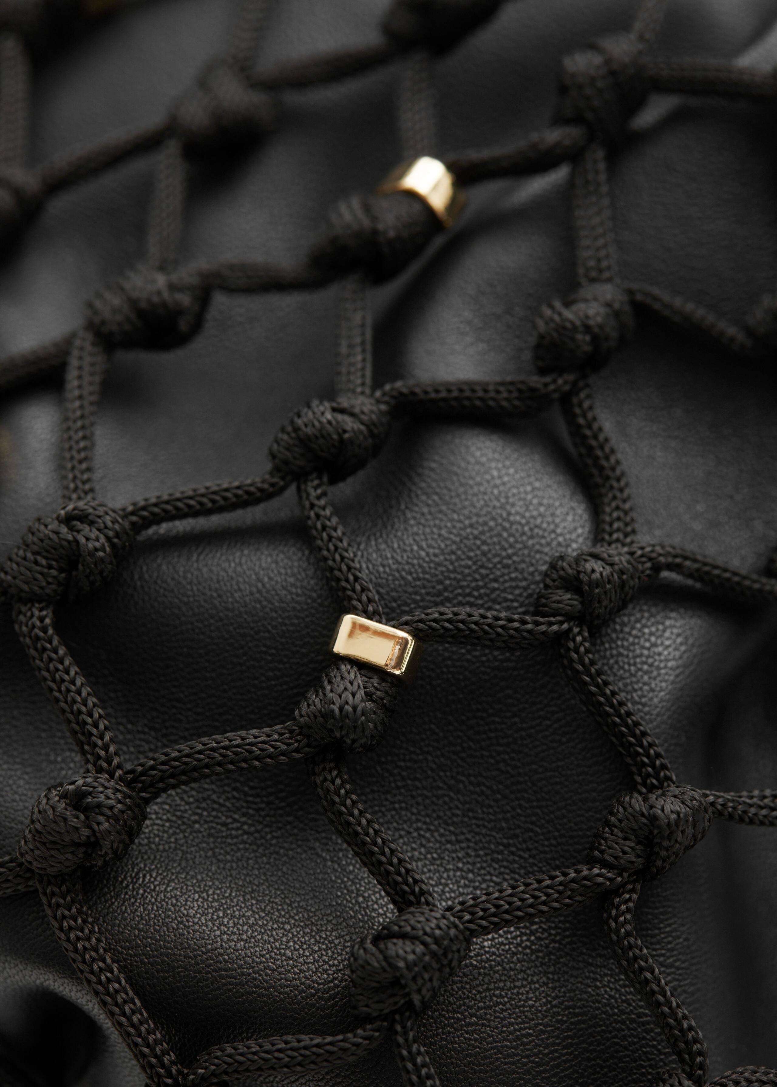 BraidedLeatherPouch - {{variantName}} - Descrizione dettagliata