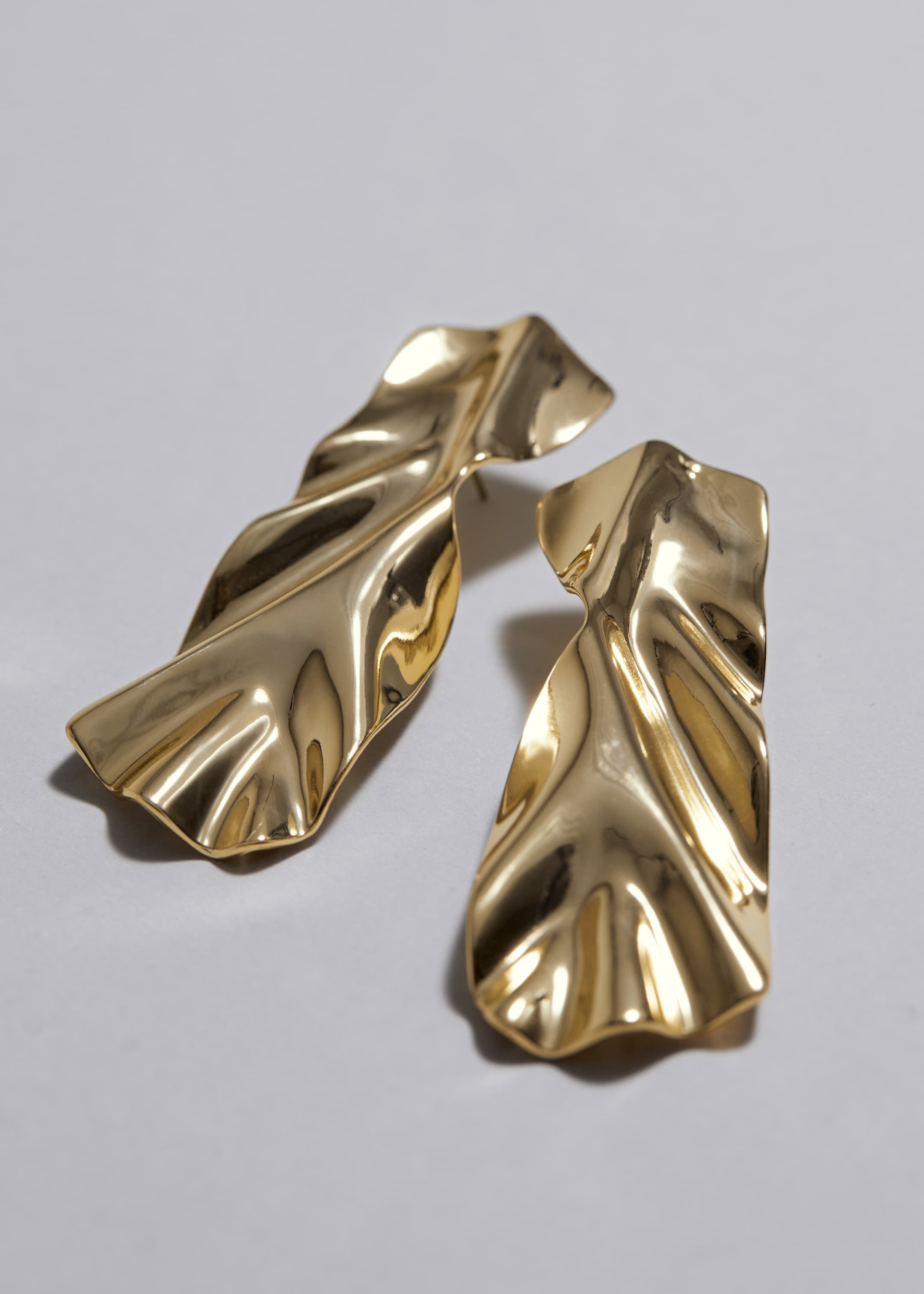 View larger image: Sculptural Draped Earrings - Gold - Ladies | H&M GB 1