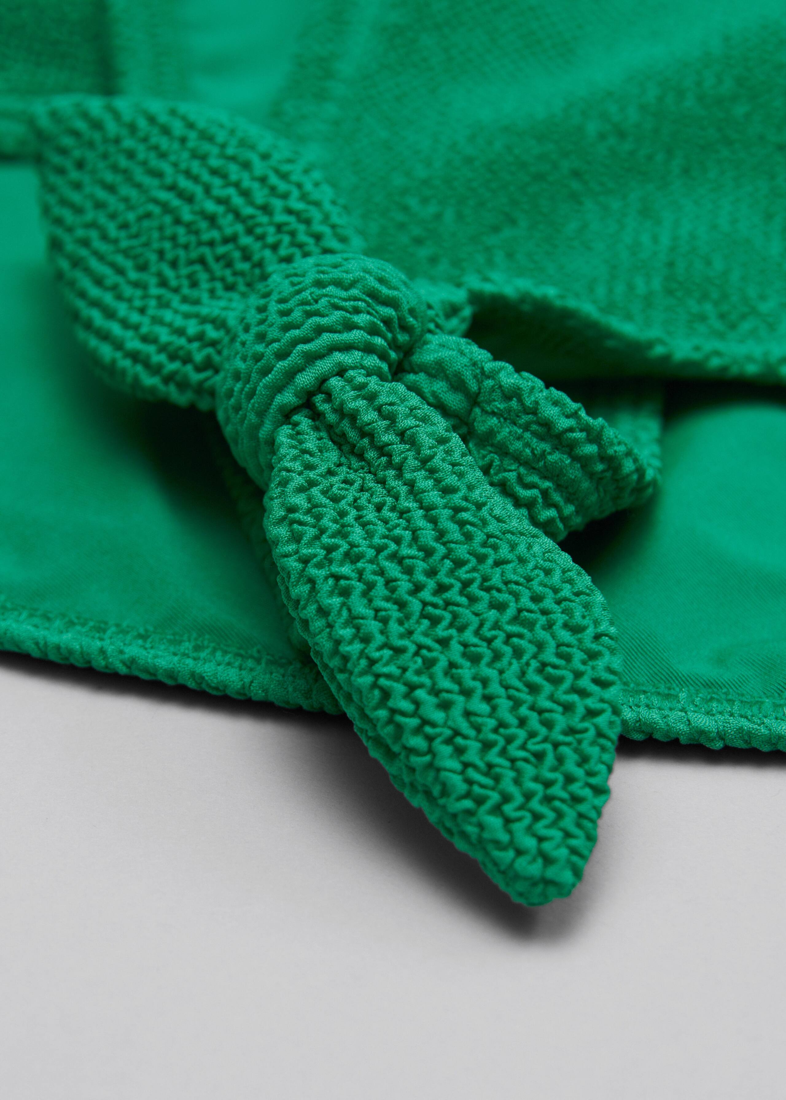 Krepp-Bikinihose mit Zierknoten - {{variantName}} - Beschreibendes Detail