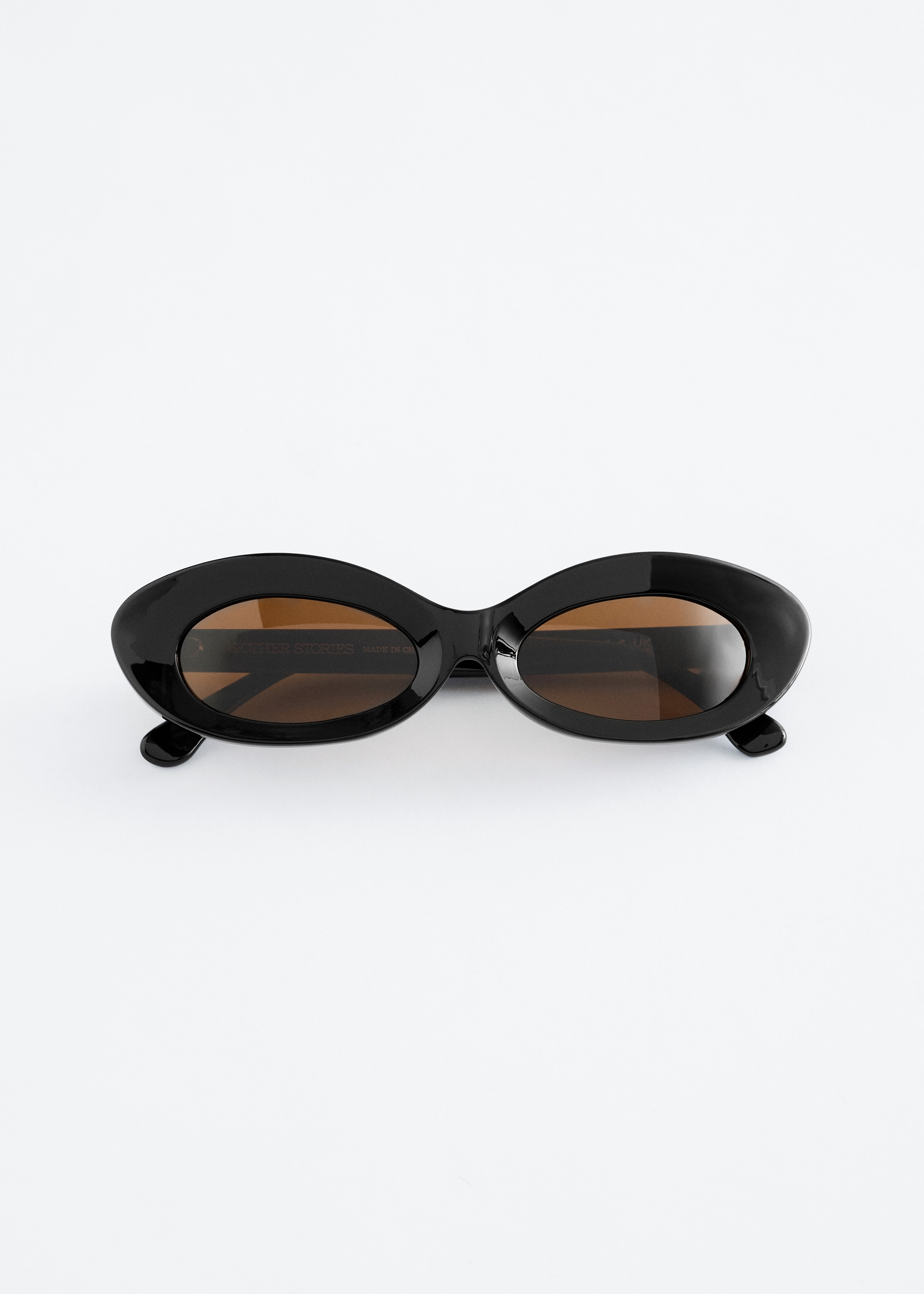 Lunettes de soleil ovales sculptées - Noir/Gris