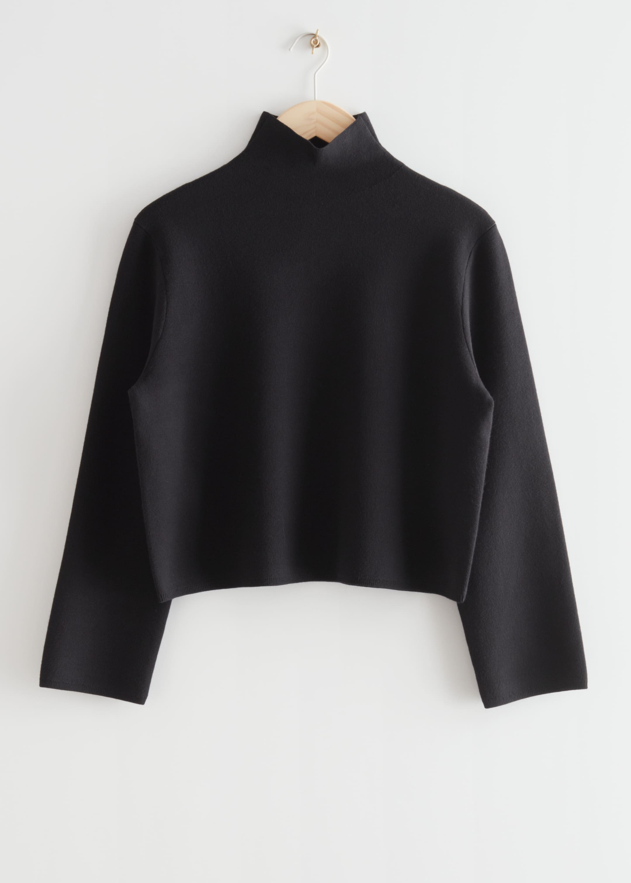 Grösseres Bild ansehen: Kastiger Strickpullover mit Rollkragen - Schwarz - DAMEN | H&M CH 1