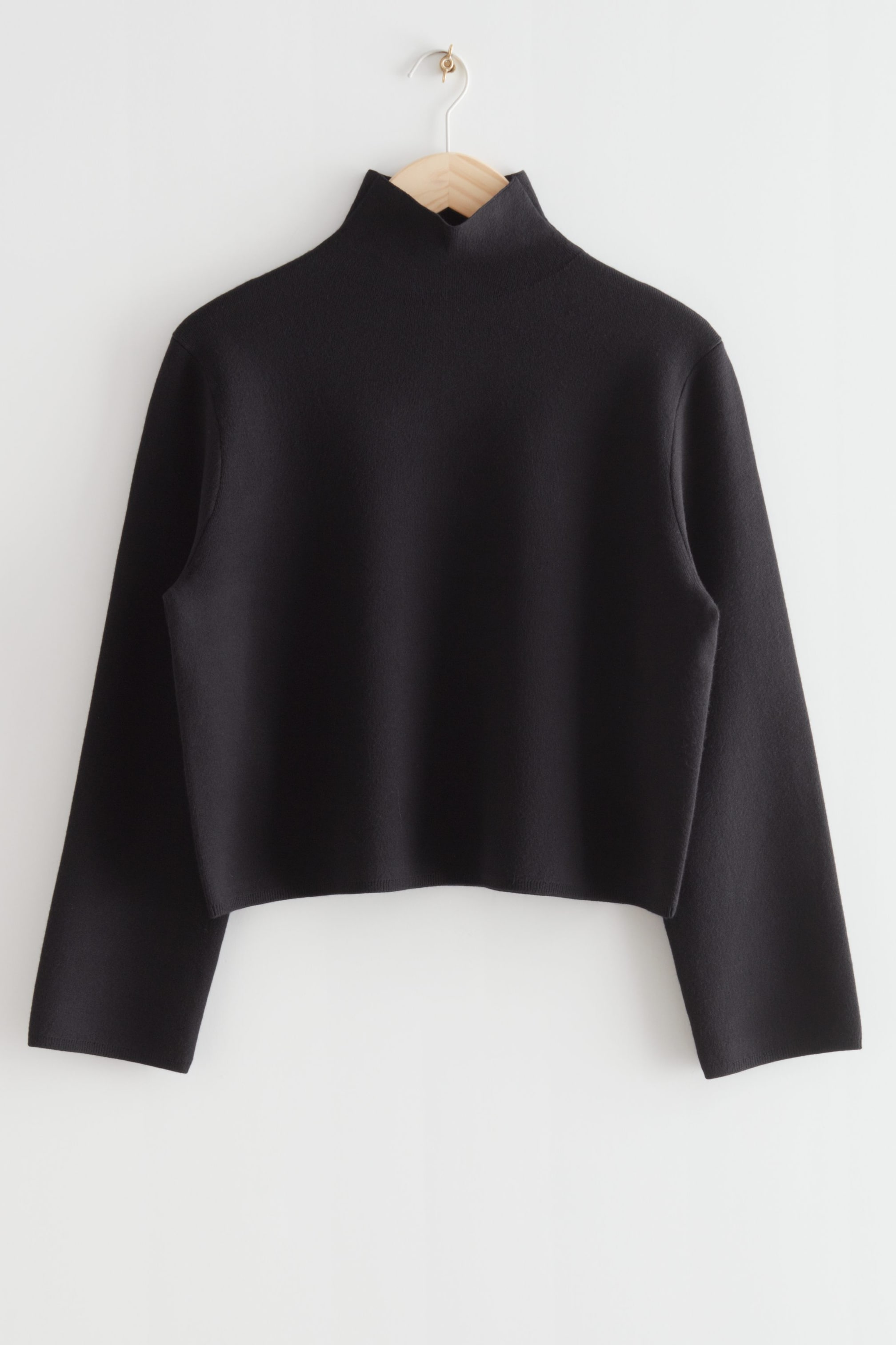 Grösseres Bild ansehen: Kastiger Strickpullover mit Rollkragen - Schwarz - DAMEN | H&M CH 1