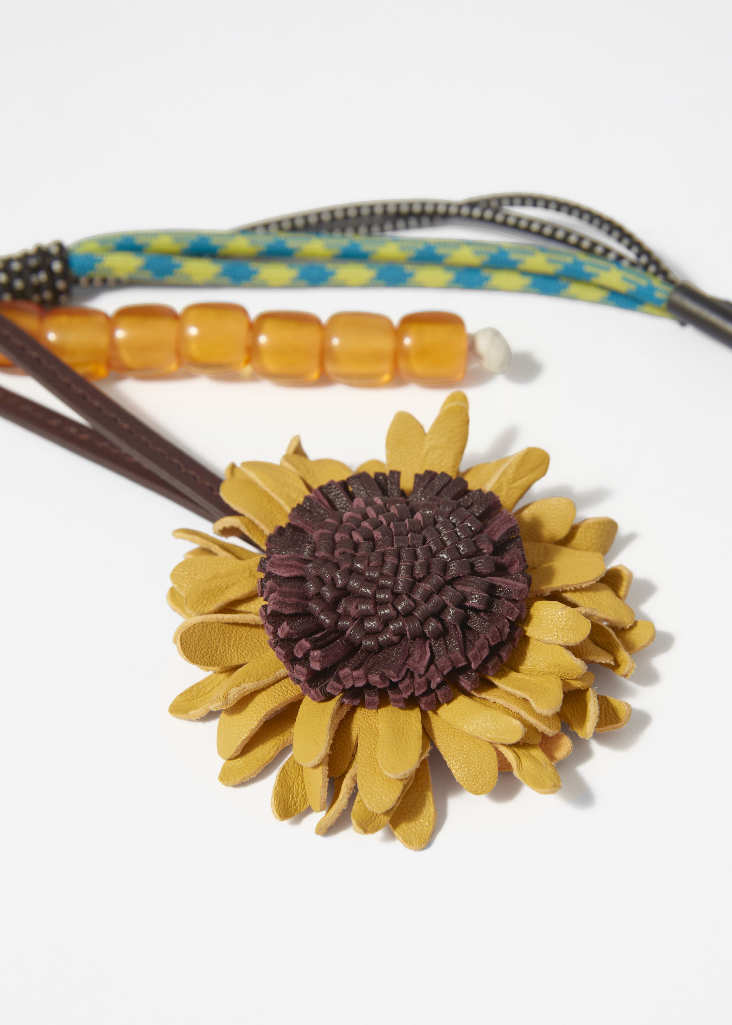 Taschenanhänger mit Sonnenblumenmotiv - {{variantName}} - Beschreibendes Detail