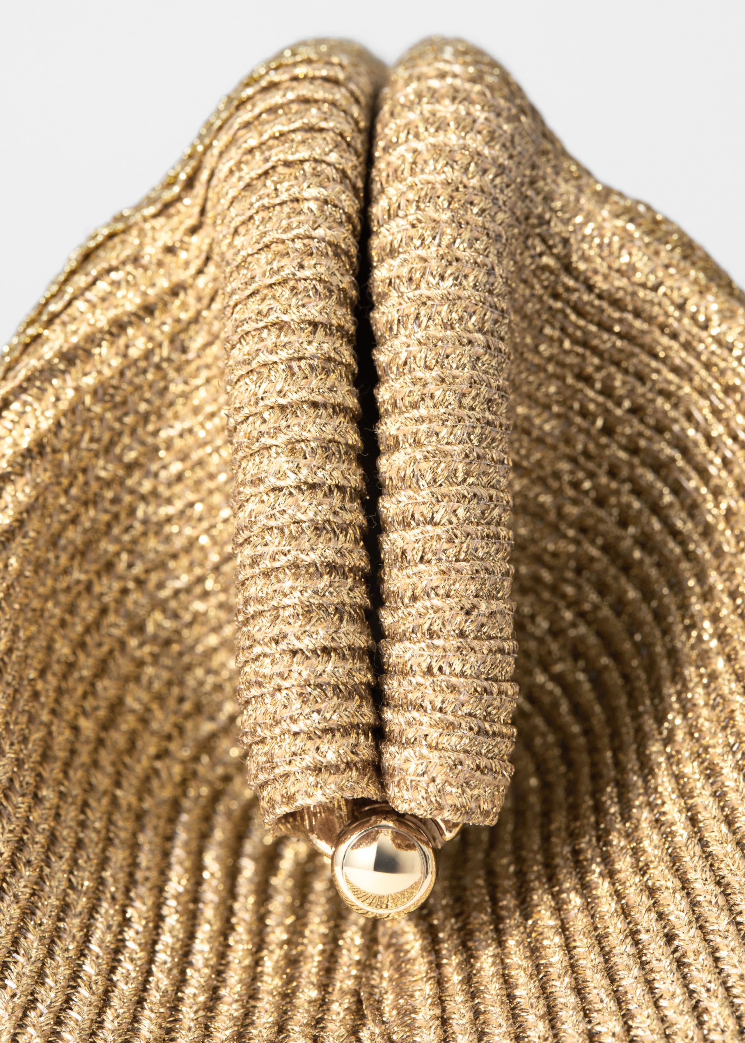 Clutch dorata - {{variantName}} - Descrizione dettagliata