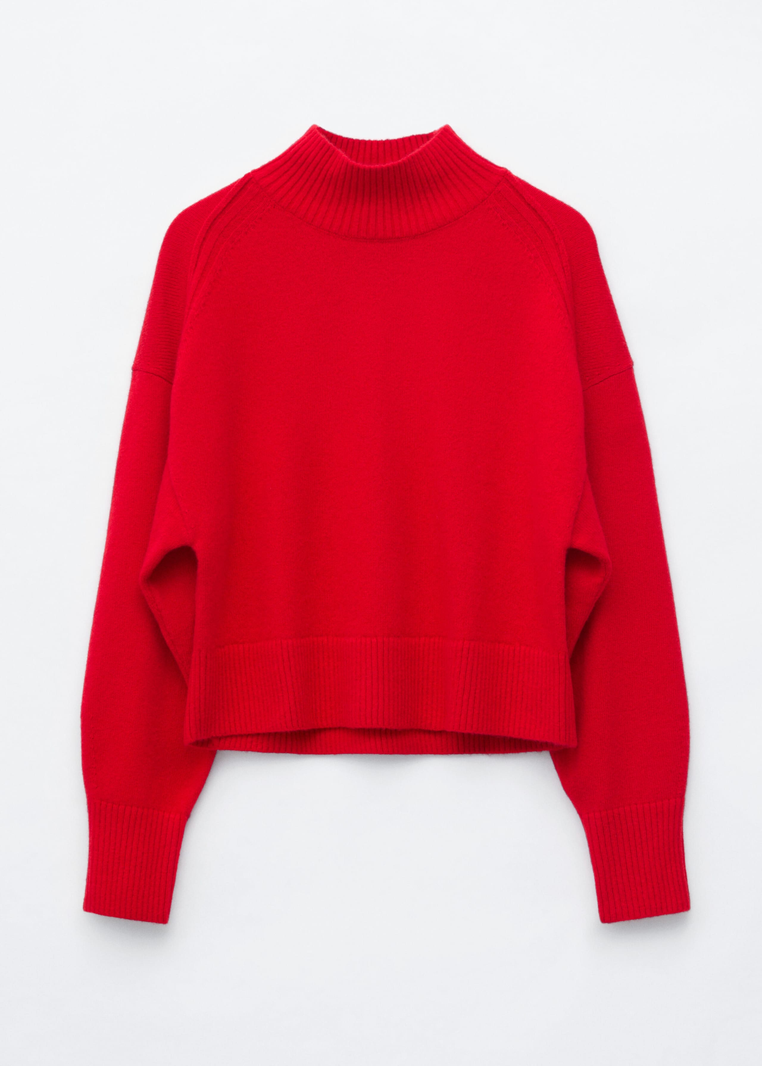 A vibrant red knit sweater is shown from the front, featuring a ribbed mock neck, dropped shoulders, and long sleeves with elongated ribbed cuffs. This relaxed-fit sweater features a wide ribbed hem.