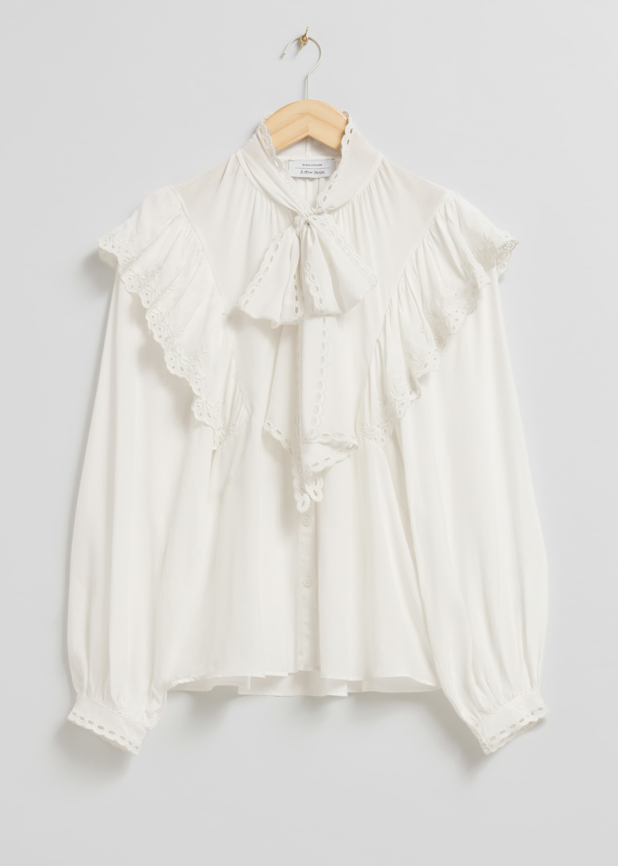 Größeres Bild anzeigen: Bluse mit Rüschen mit Wellenkante - Ivory - Ladies | H&M AT 1