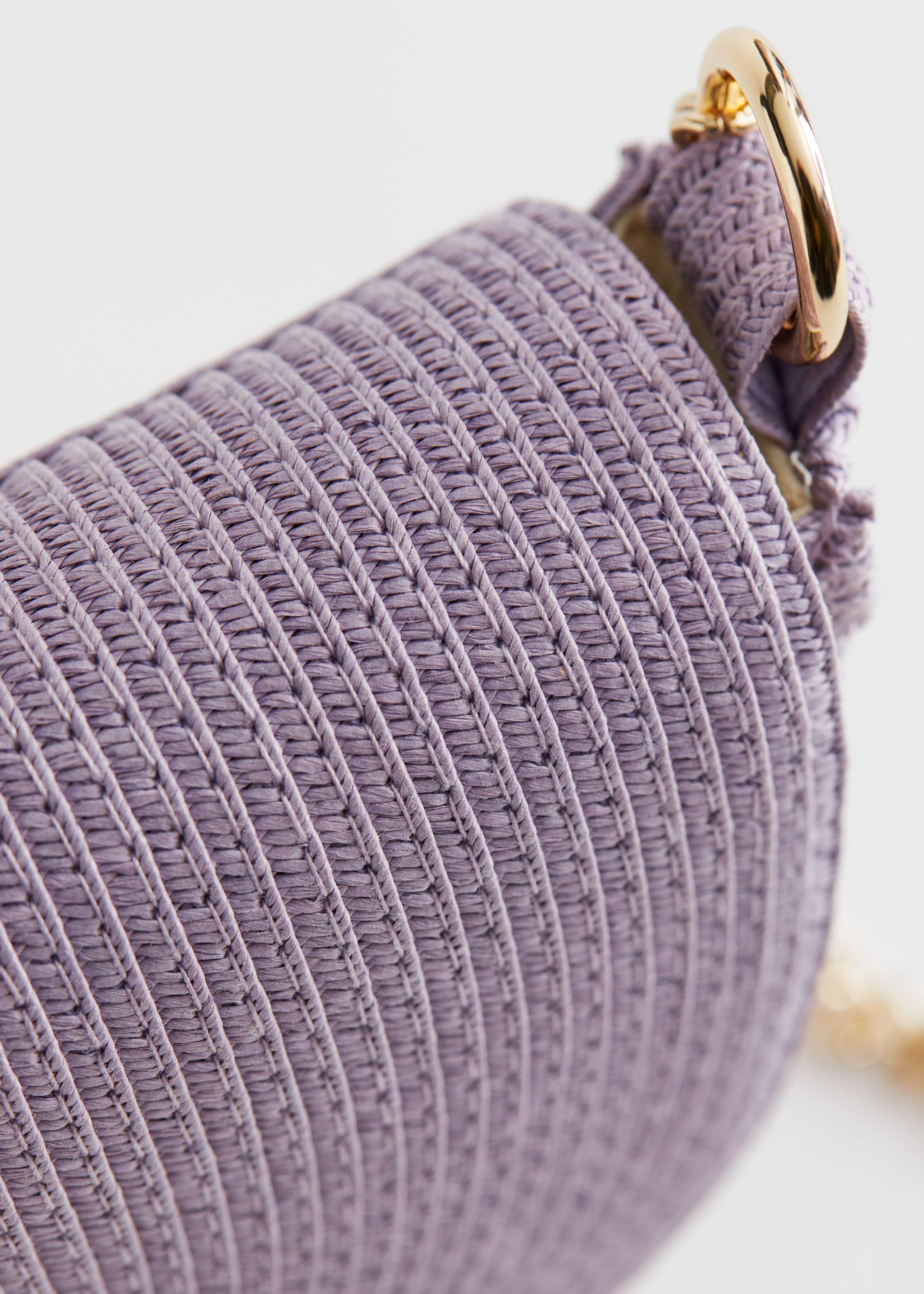 StrawCrossbodyHalfMoonBag - {{variantName}} - Descrizione dettagliata