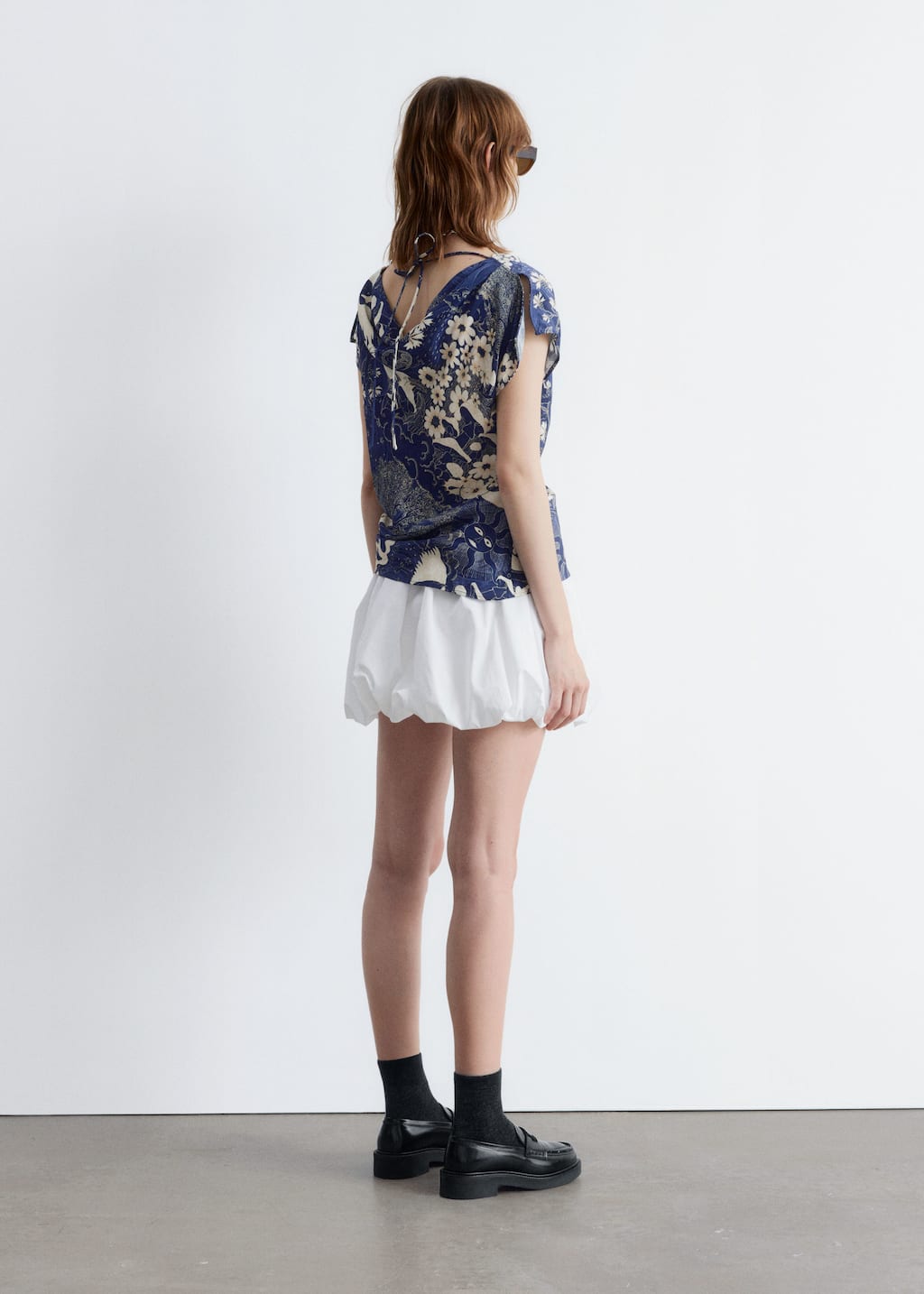 Image of Topp med draperad urringning