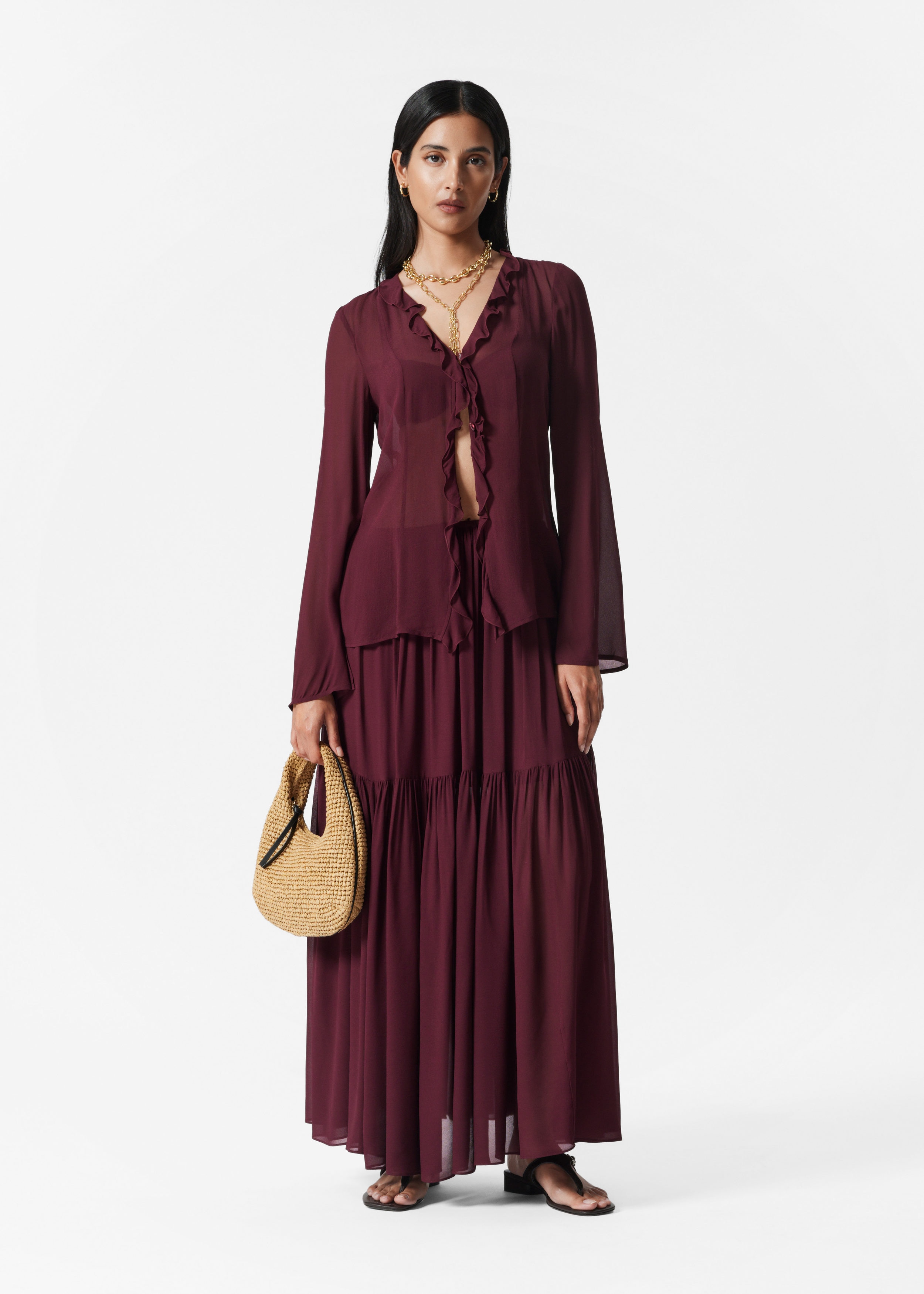 Image of Blusa con volantes y escote en pico