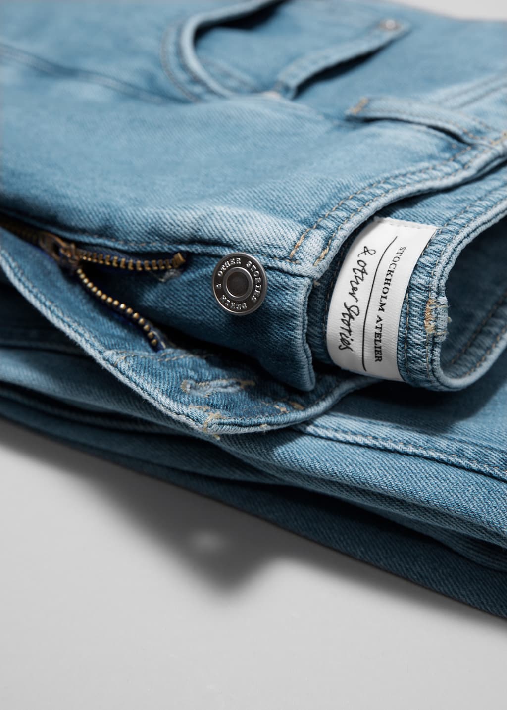 High-Waist Barrel-Leg Jeans - {{variantName}} - Descriptive Detail