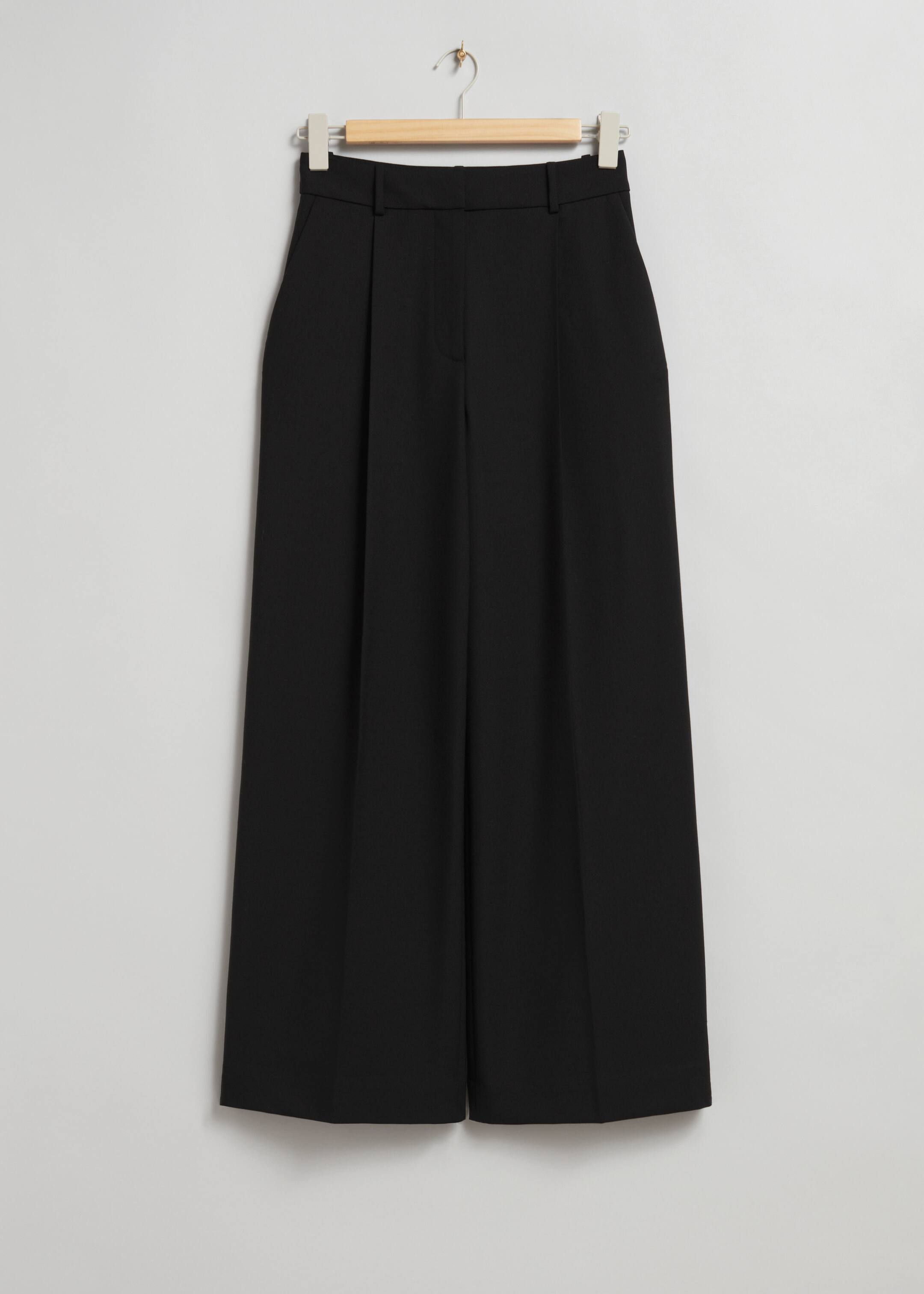 Visa större bild: Byxa med lagda veck - Svart - DAM | H&M SE 1