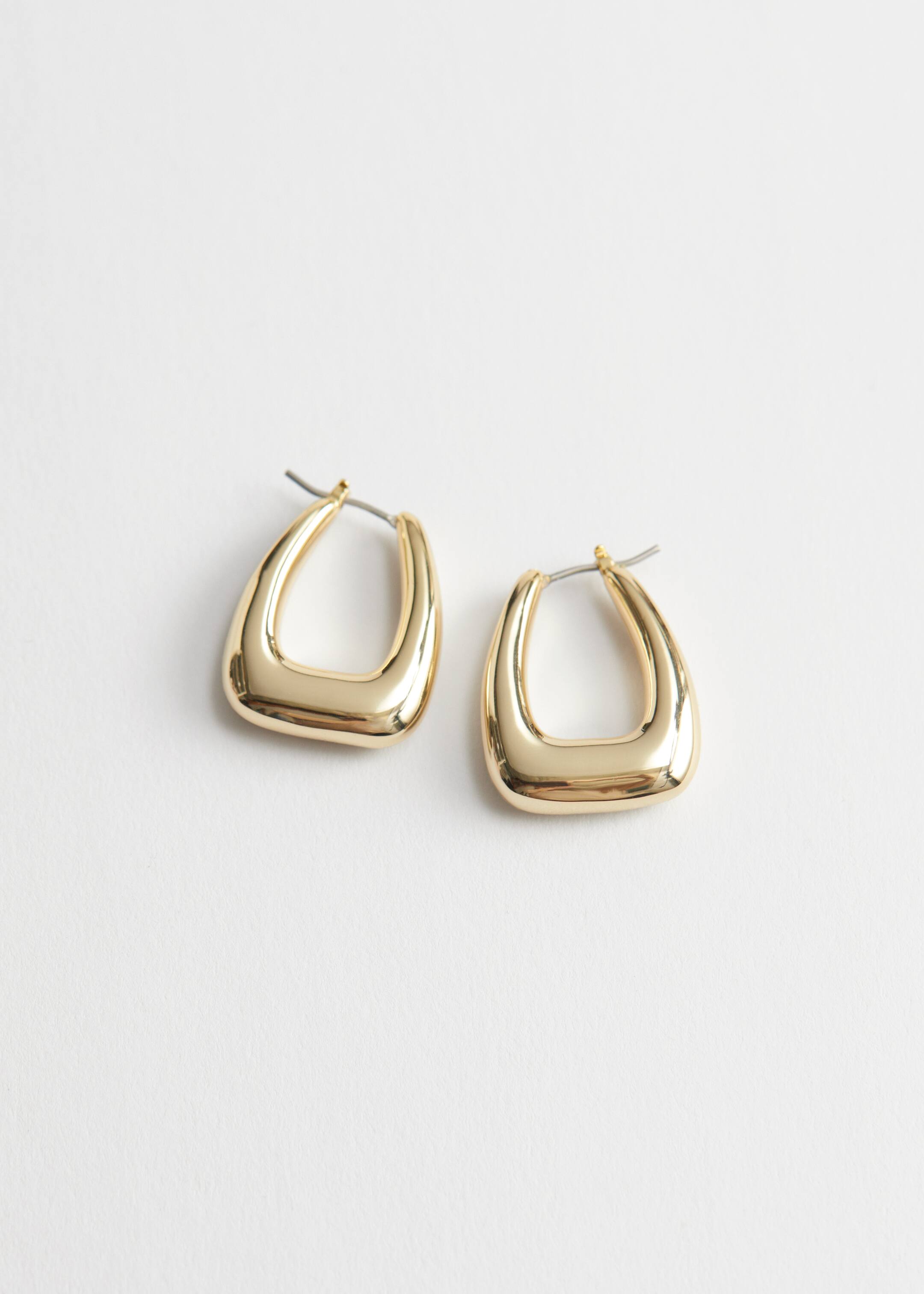 Größeres Bild anzeigen: Dicke, ovale Hoop-Ohrringe - Gold - Ladies | H&M AT 1