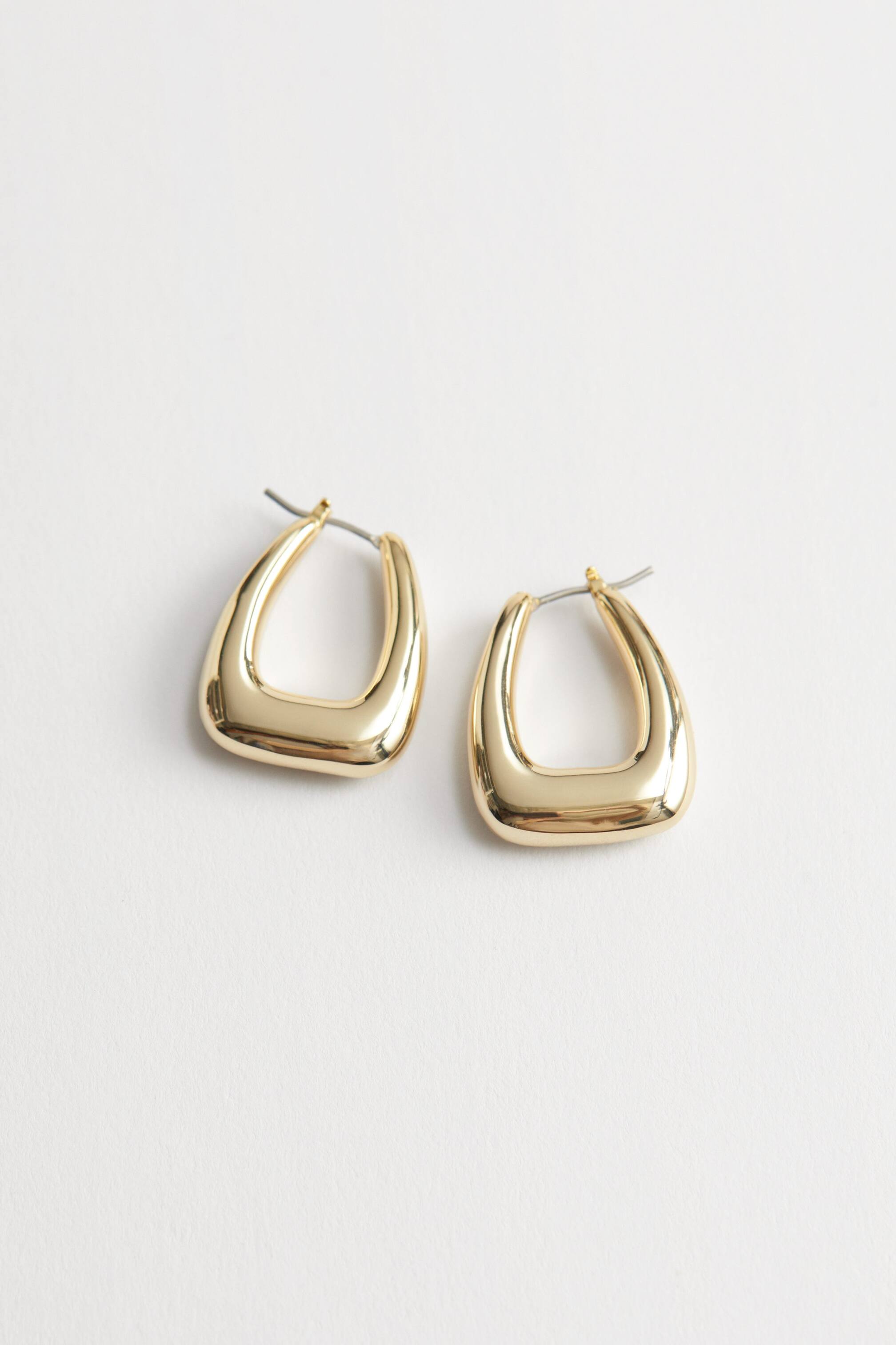 Größeres Bild anzeigen: Dicke, ovale Hoop-Ohrringe - Gold - Ladies | H&M AT 1
