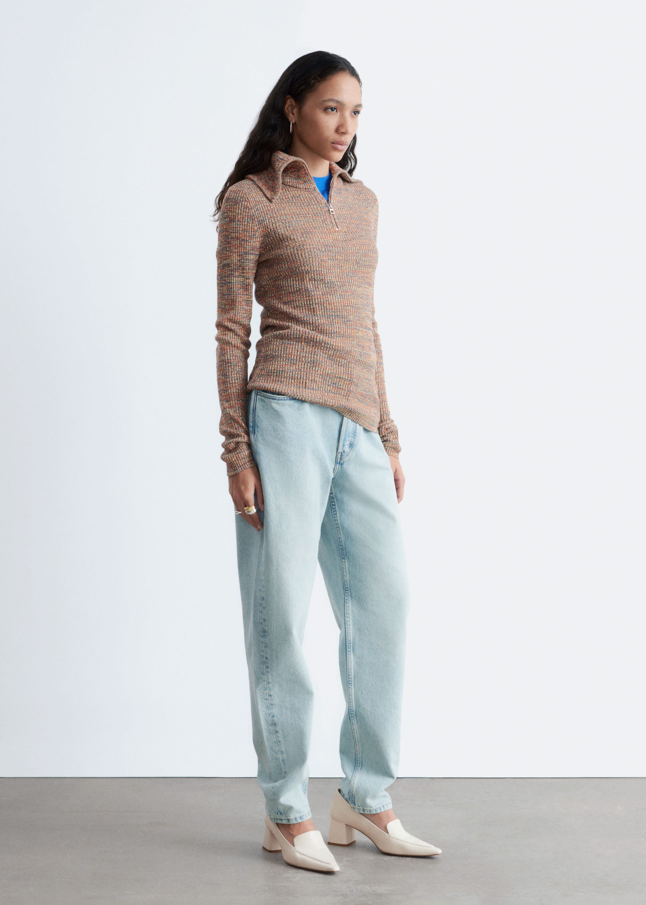 Image of Melangestickad topp med halv dragkedja