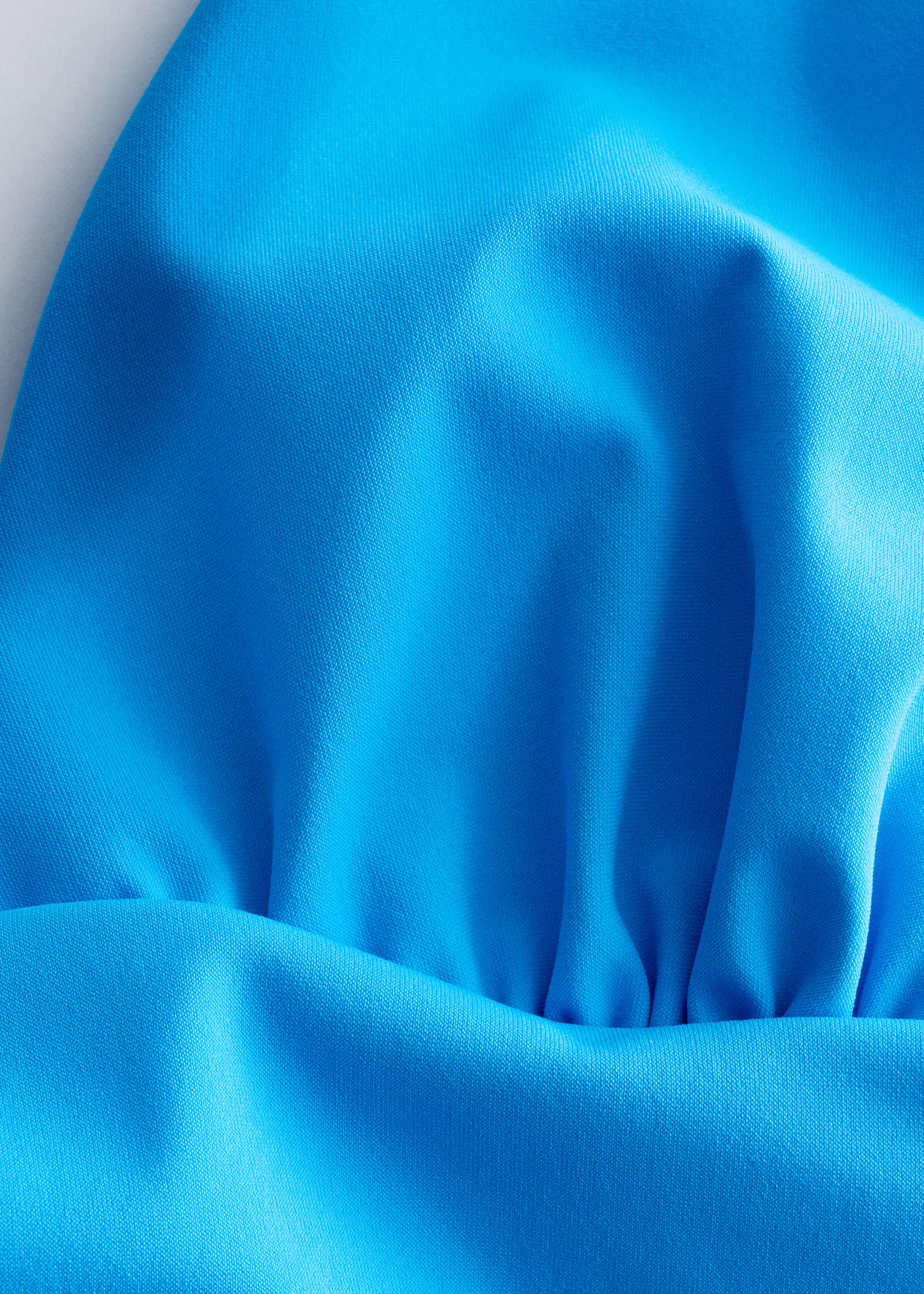 V-Neck Swimsuit - {{variantName}} - Descriptive Detail