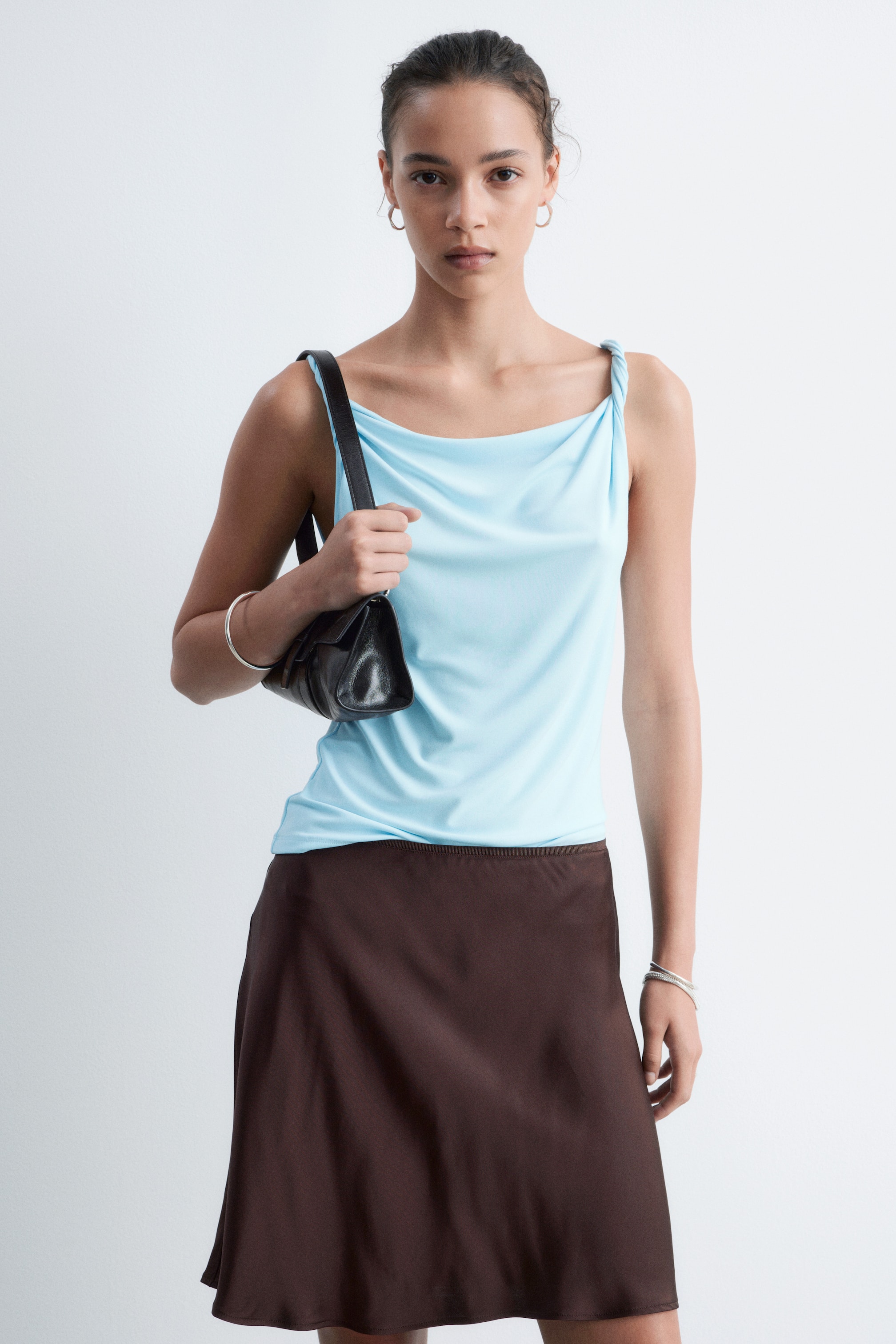Ver imagen más grande: Top de punto con tirantes retorcidos - Azul claro - MUJER | H&M ES 1