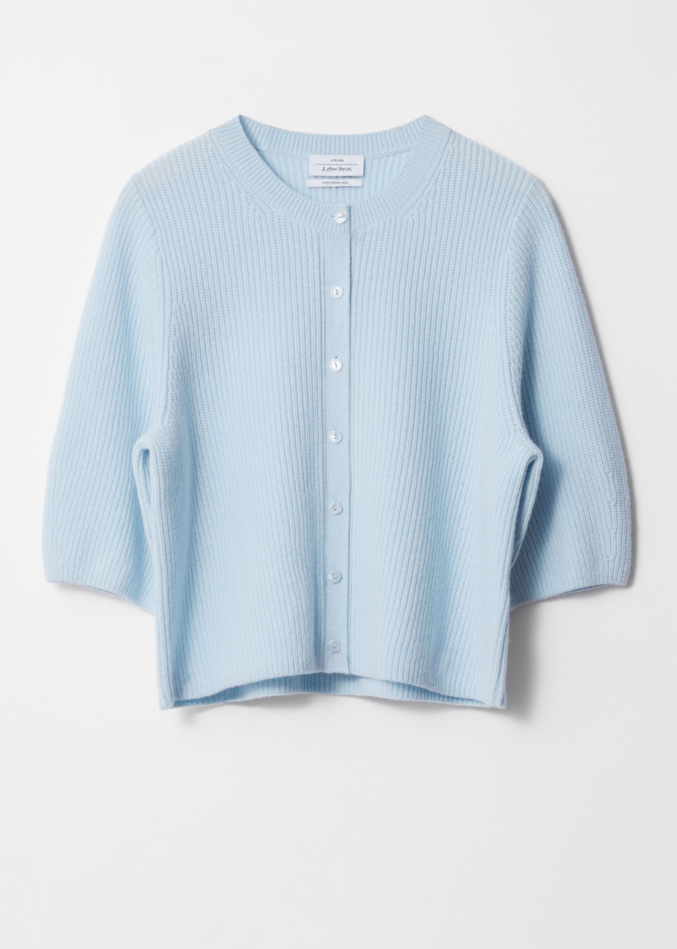 Gerippte Strickjacke aus Merinowolle - Hellblau - Stillleben