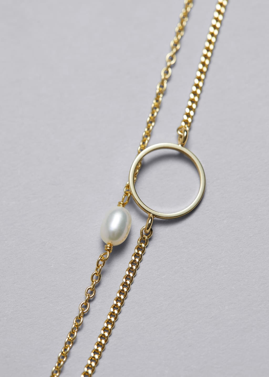 Bracciale a catena con perla d'acqua dolce - {{variantName}} - Descrizione dettagliata