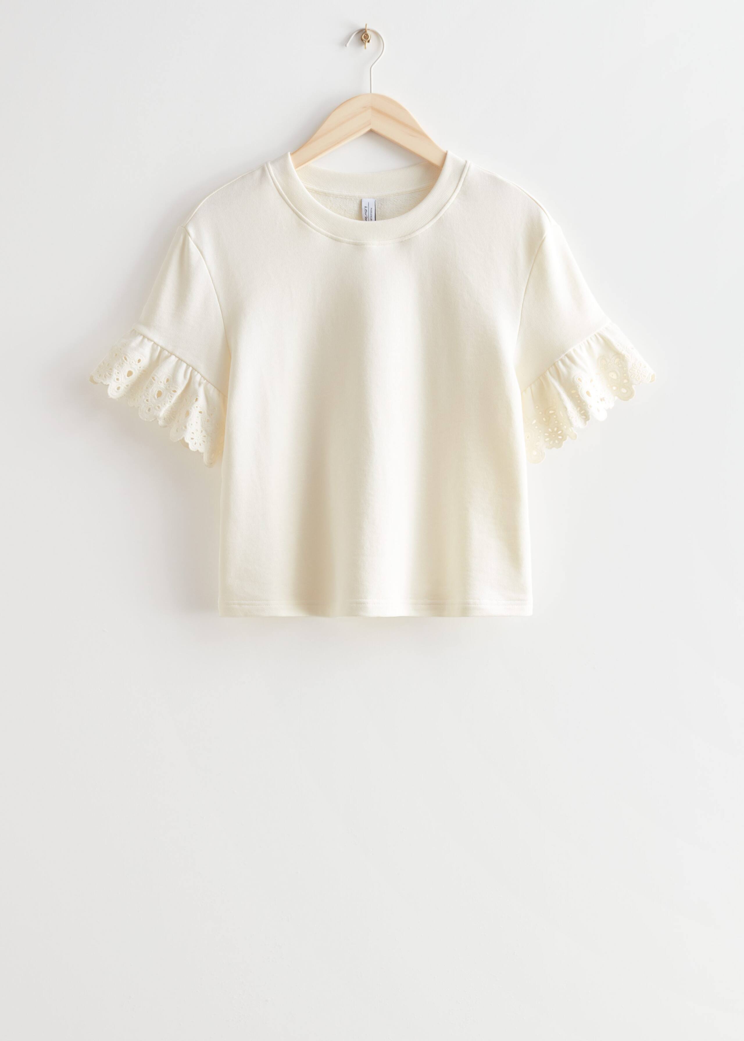 Embroidered Cuff Fleece Top - White - Still Life