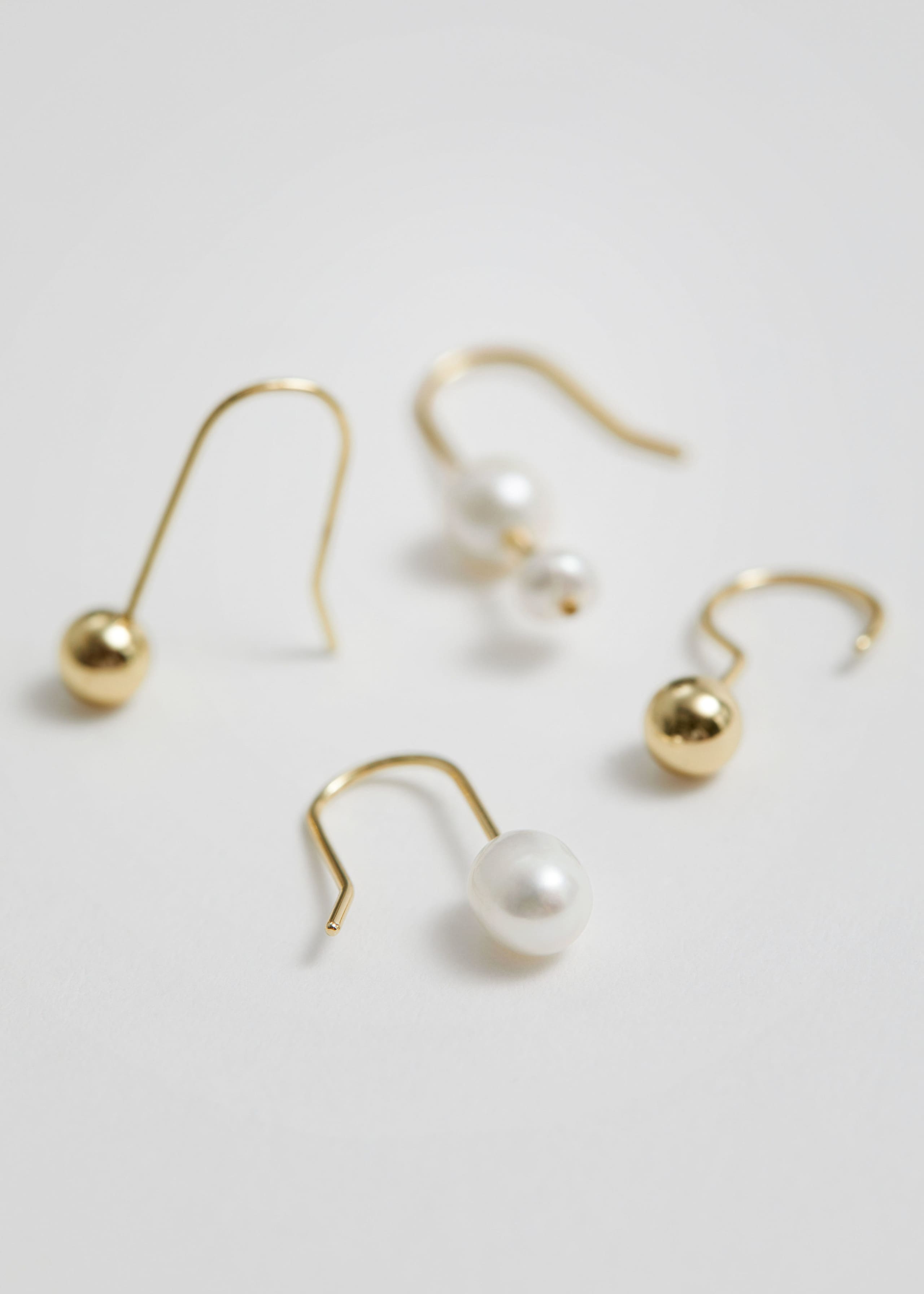 Set mit verschiedenen Ohrringen - {{variantName}} - Beschreibendes Detail