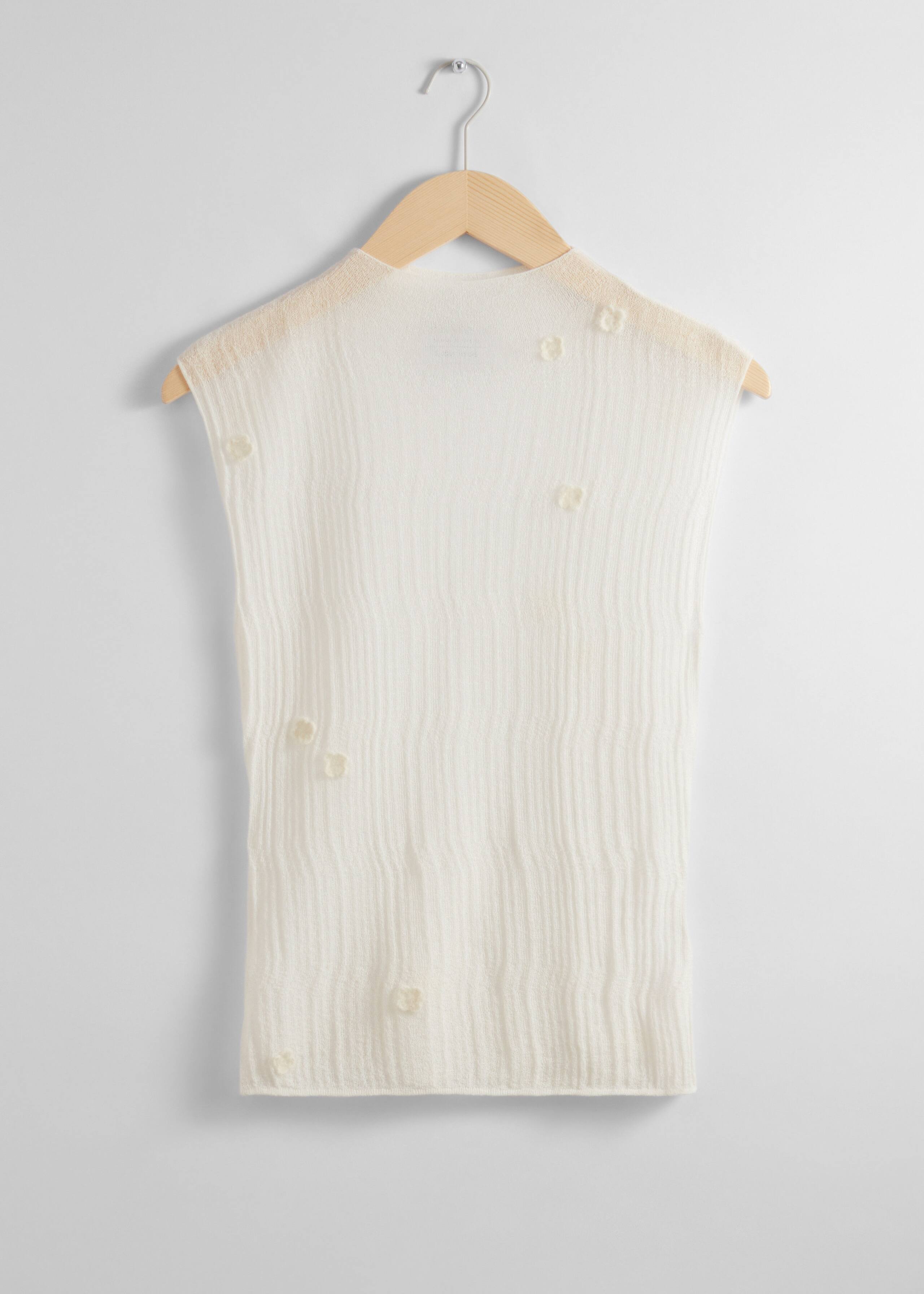 Top transparente sin mangas