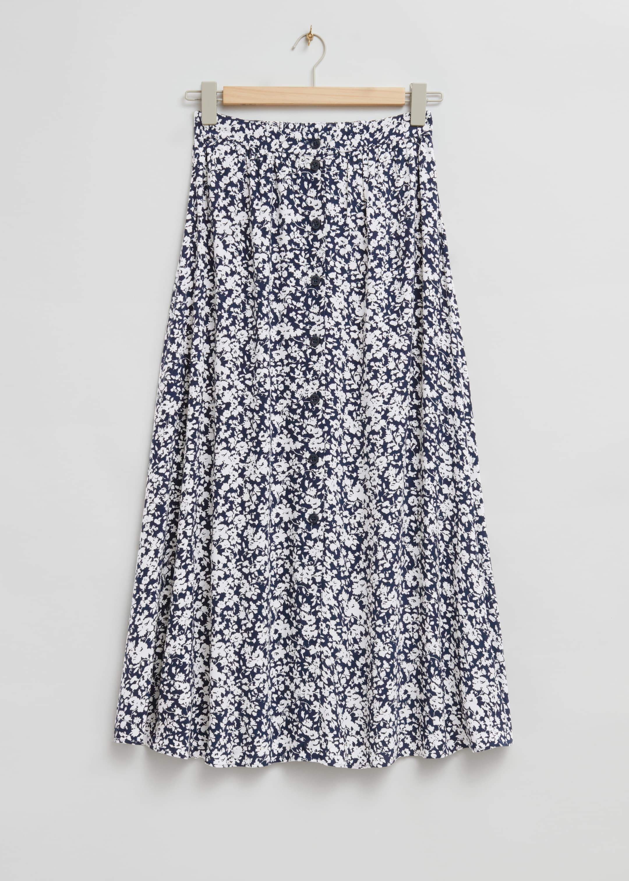 Προβολή μεγαλύτερης εικόνας: Κουμπωτή Φούστα Α-Γραμμής Μίντι - Dark Blue/White Floral Print - Ladies | H&M GR 1