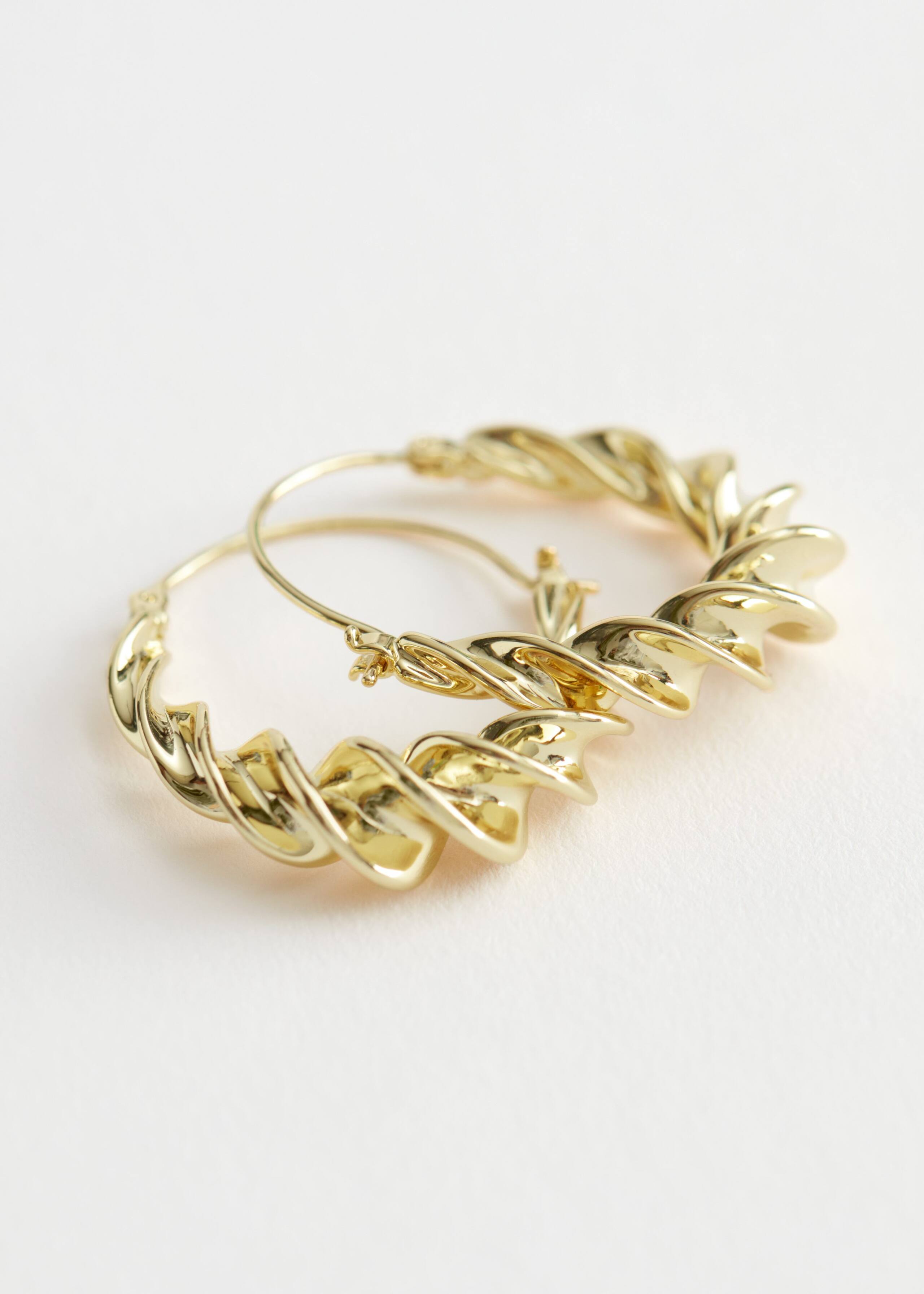 TwistedEffectHoopEarrings - {{variantName}} - Descrizione dettagliata