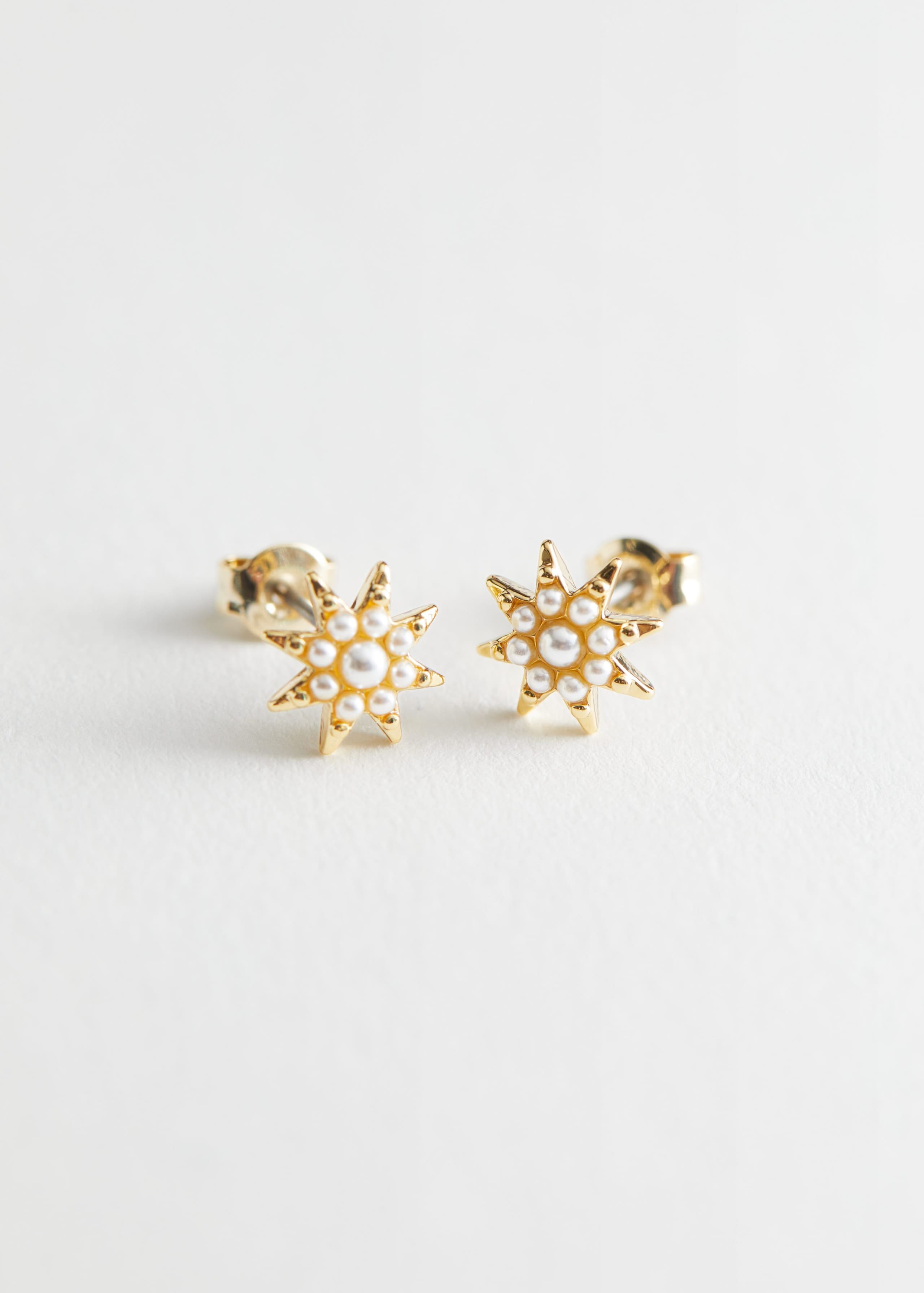 StarPendantStudEarrings - Gold-coloured - Bodegón