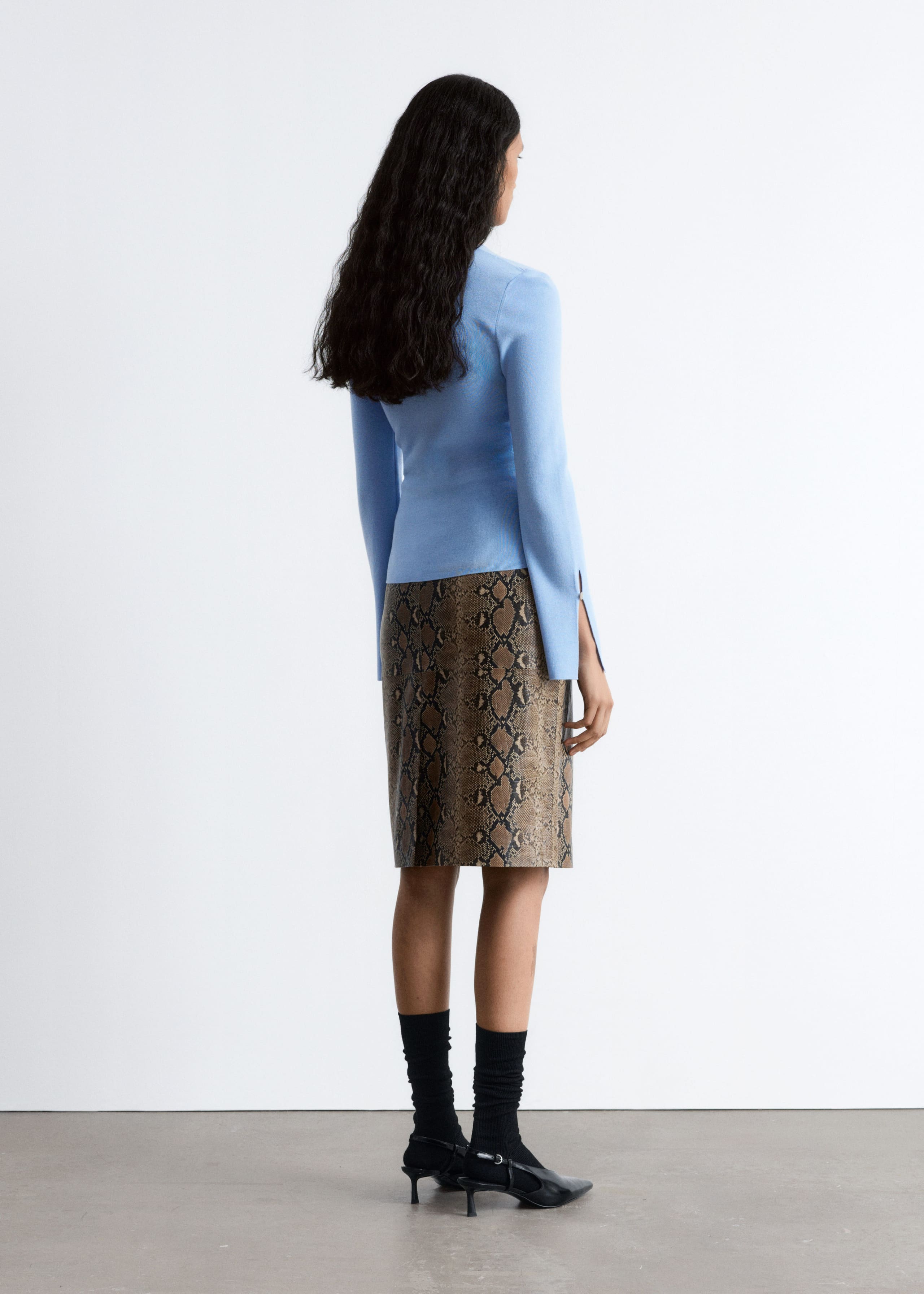 Image of Cardigan aderente in lana