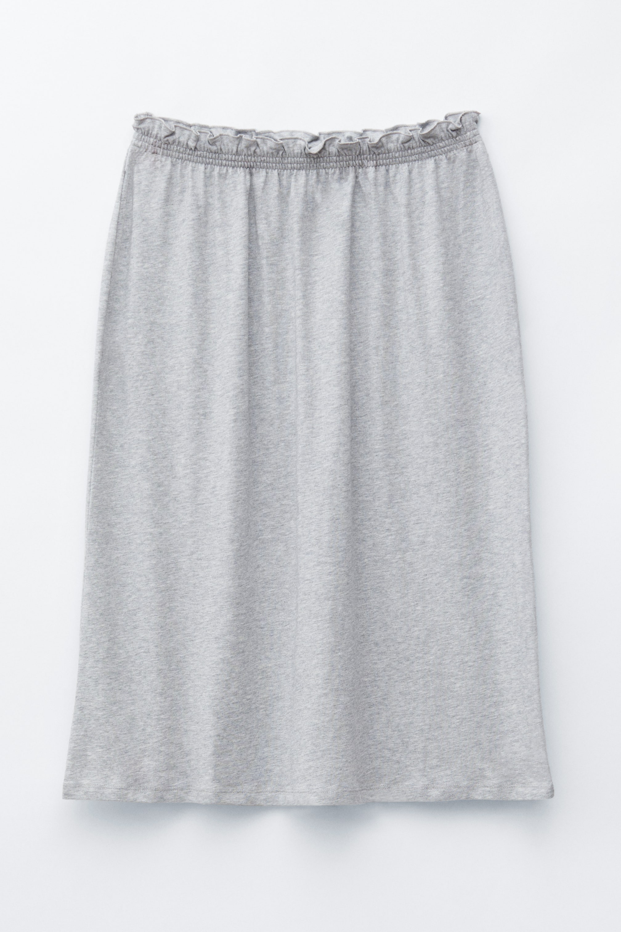 Se større billede: En grå knælang jerseynederdel vises forfra, med en rynket elastisk linning og en bølget kant.