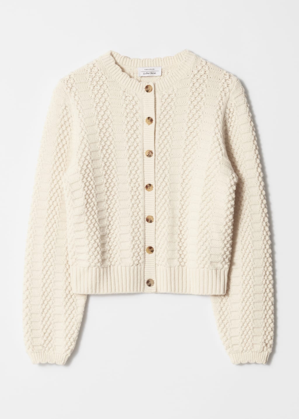 Texturstickad cardigan – Crèmevit – stilleben