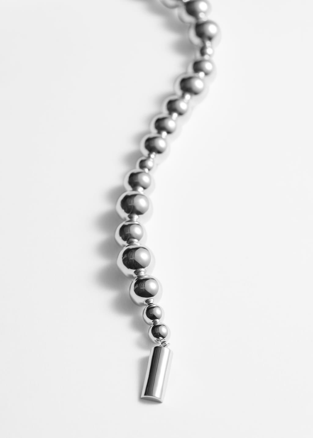 Collana con perle asimmetriche - {{variantName}} - Descrizione dettagliata