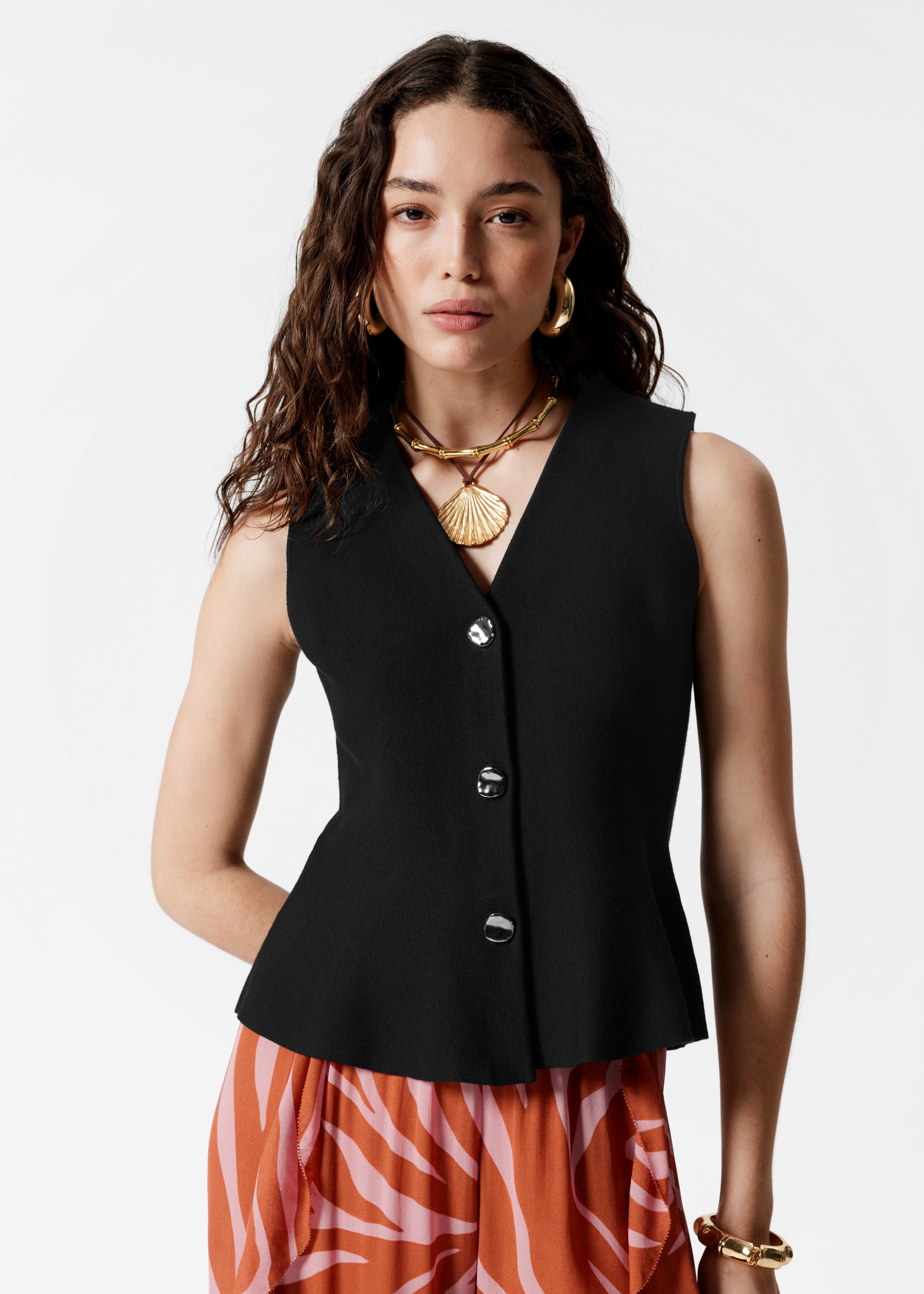 Strickweste mit Schößchen - Schwarz/Weiß