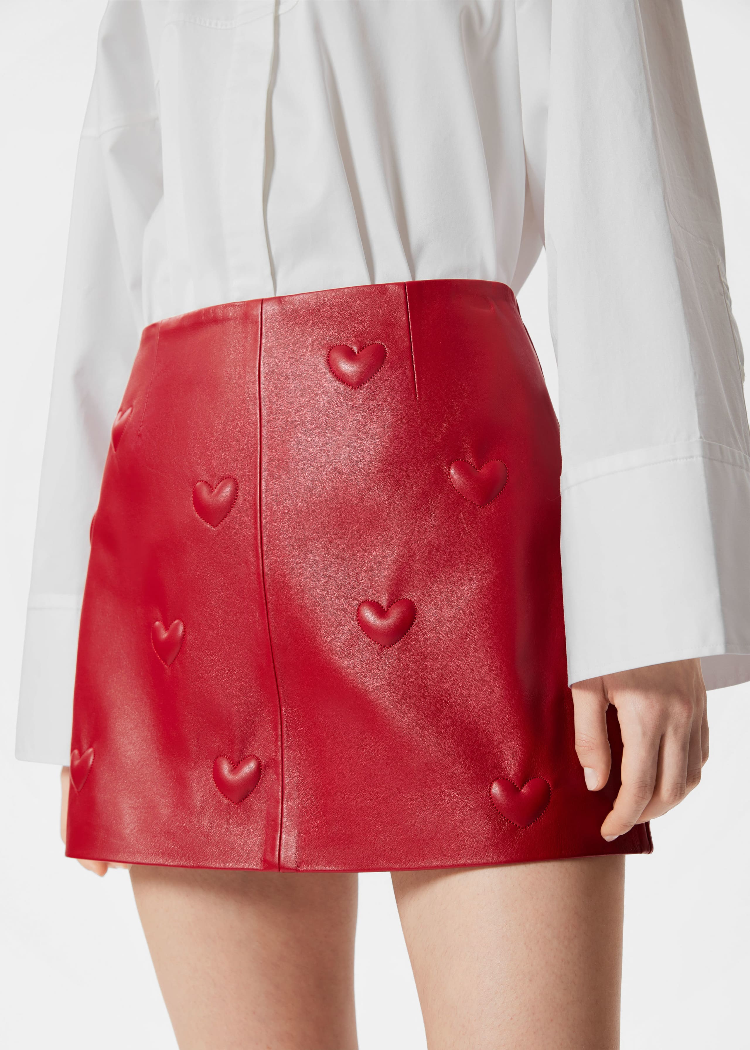 Image of Heart-Embossed Leather Mini Skirt