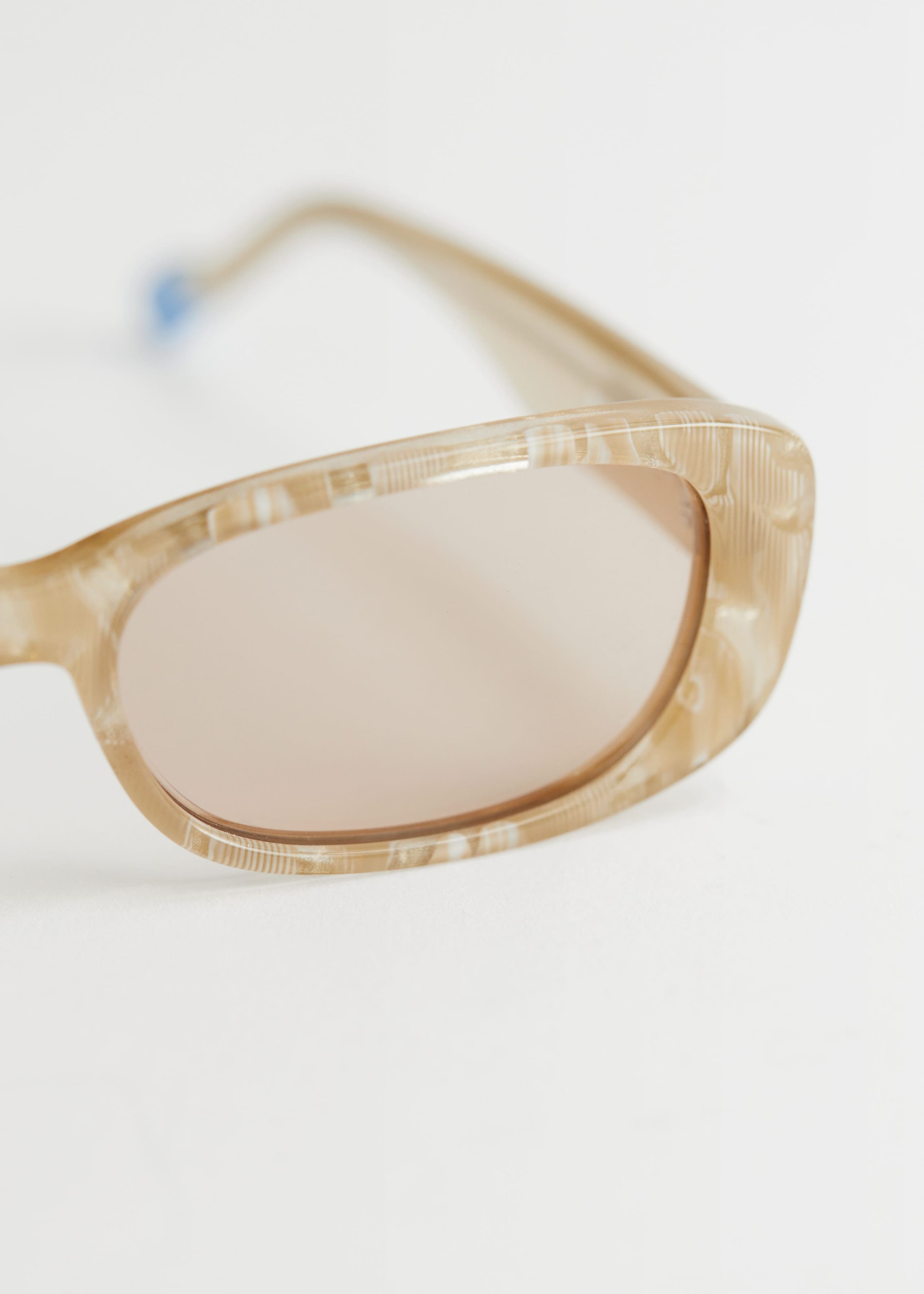 Le Specs Uh Duh Sunglasses - {{variantName}} - Descrizione dettagliata