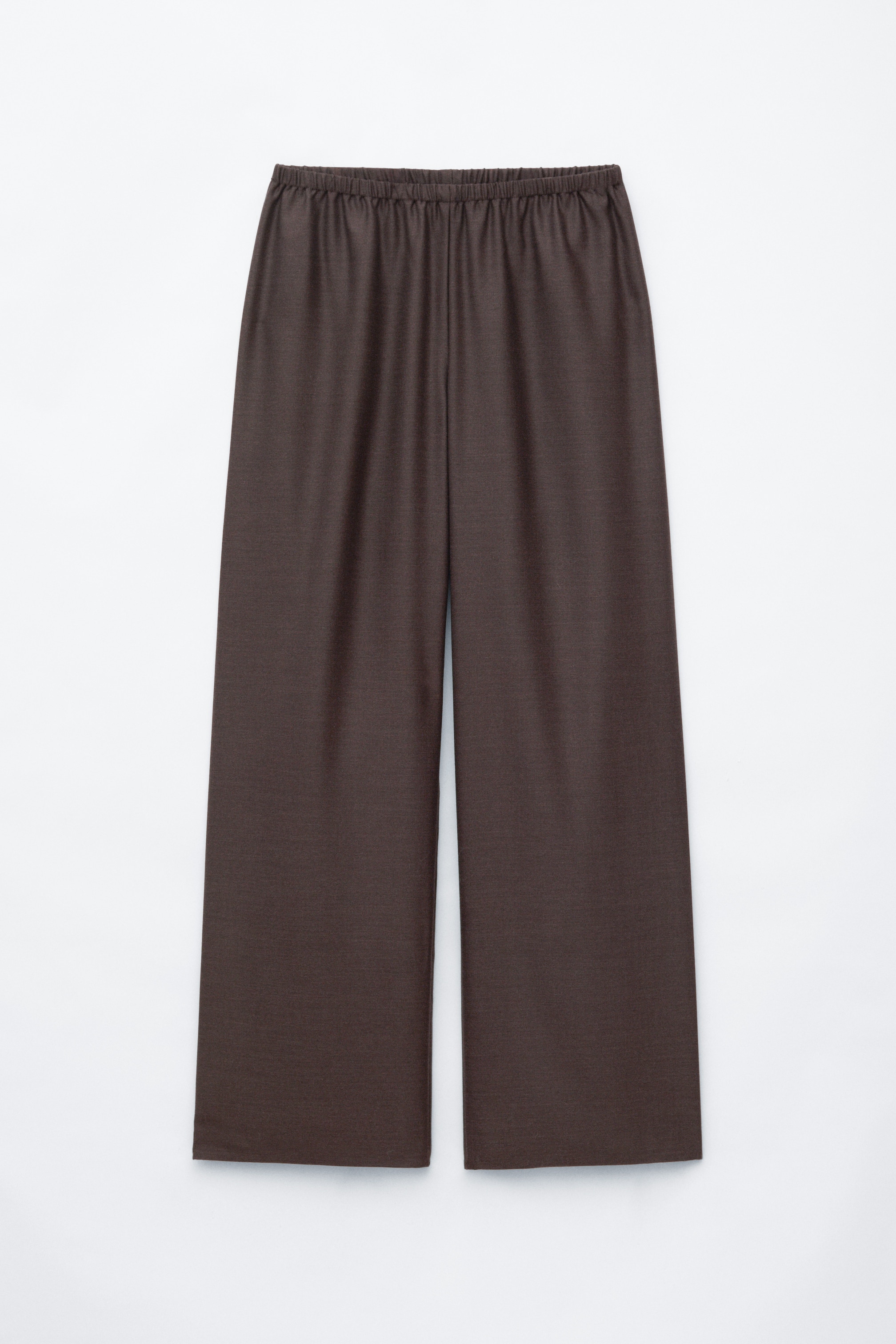 Visualizza l'immagine ingrandita: Questi pantaloni pull-on in lana marrone scuro, fronte: davanti, presentano una cintura elasticizzata e arricciata e una silhouette rilassata a gamba larga con un davanti pulito, senza cuciture.