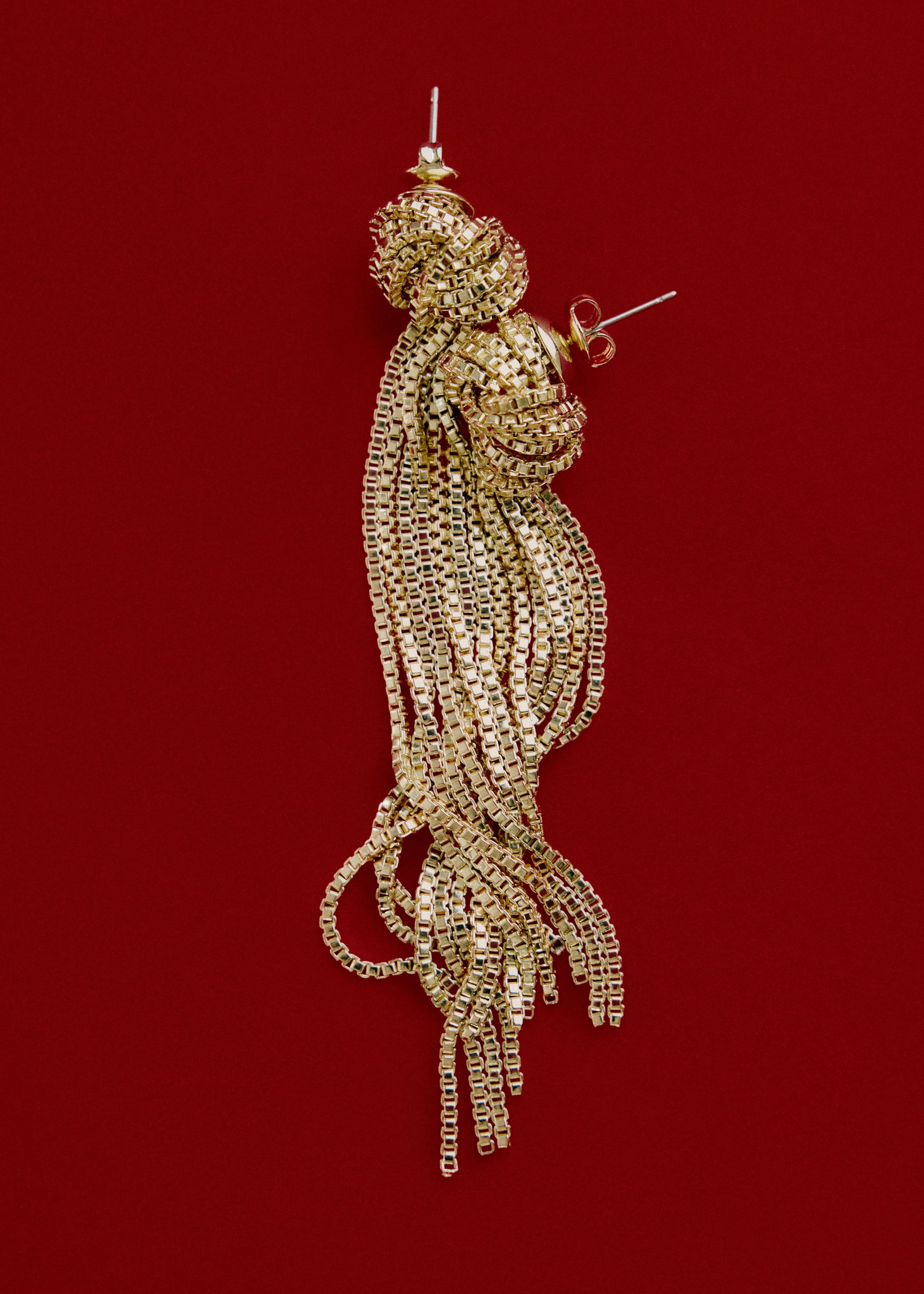 Image of Orecchini pendenti con dettaglio annodato