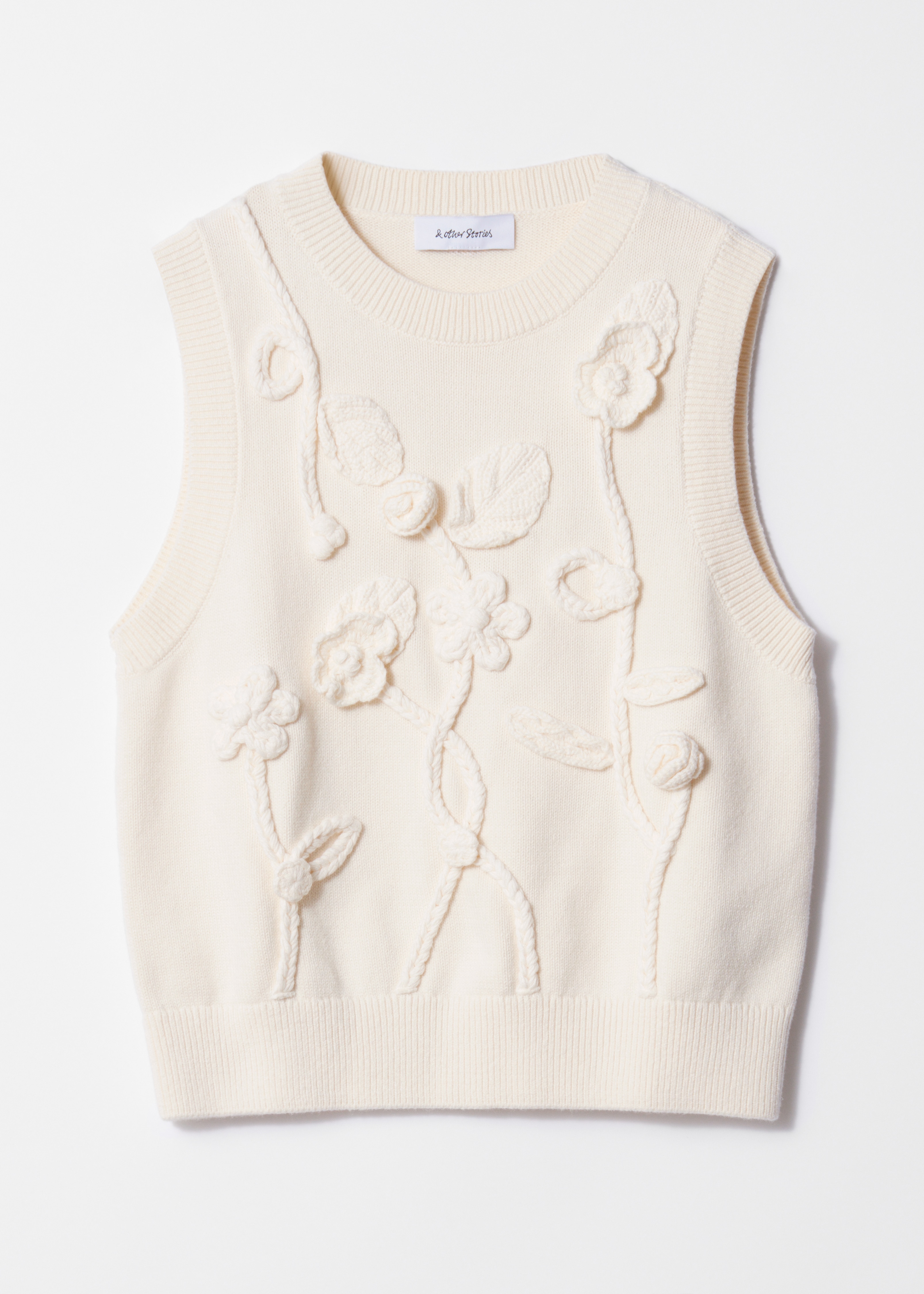 Genservest med blomsterappliqué - Krem