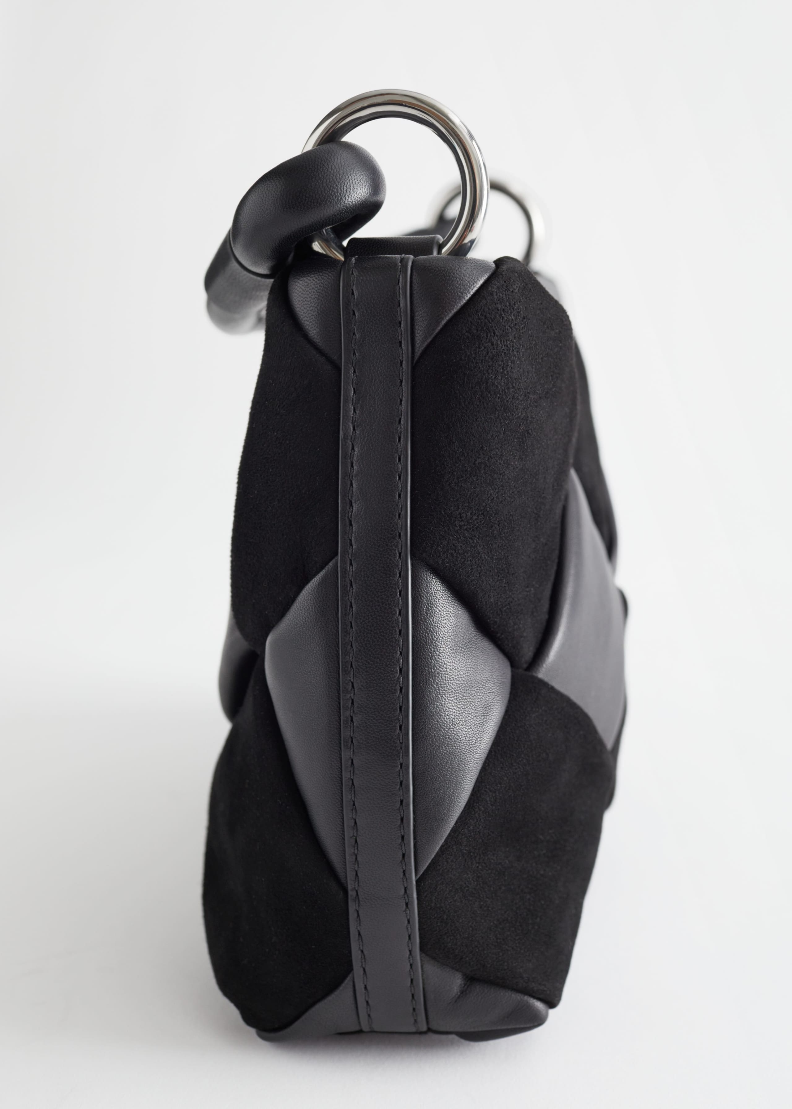 BraidedLeatherCrossbodyBag - {{variantName}} - Descrizione dettagliata