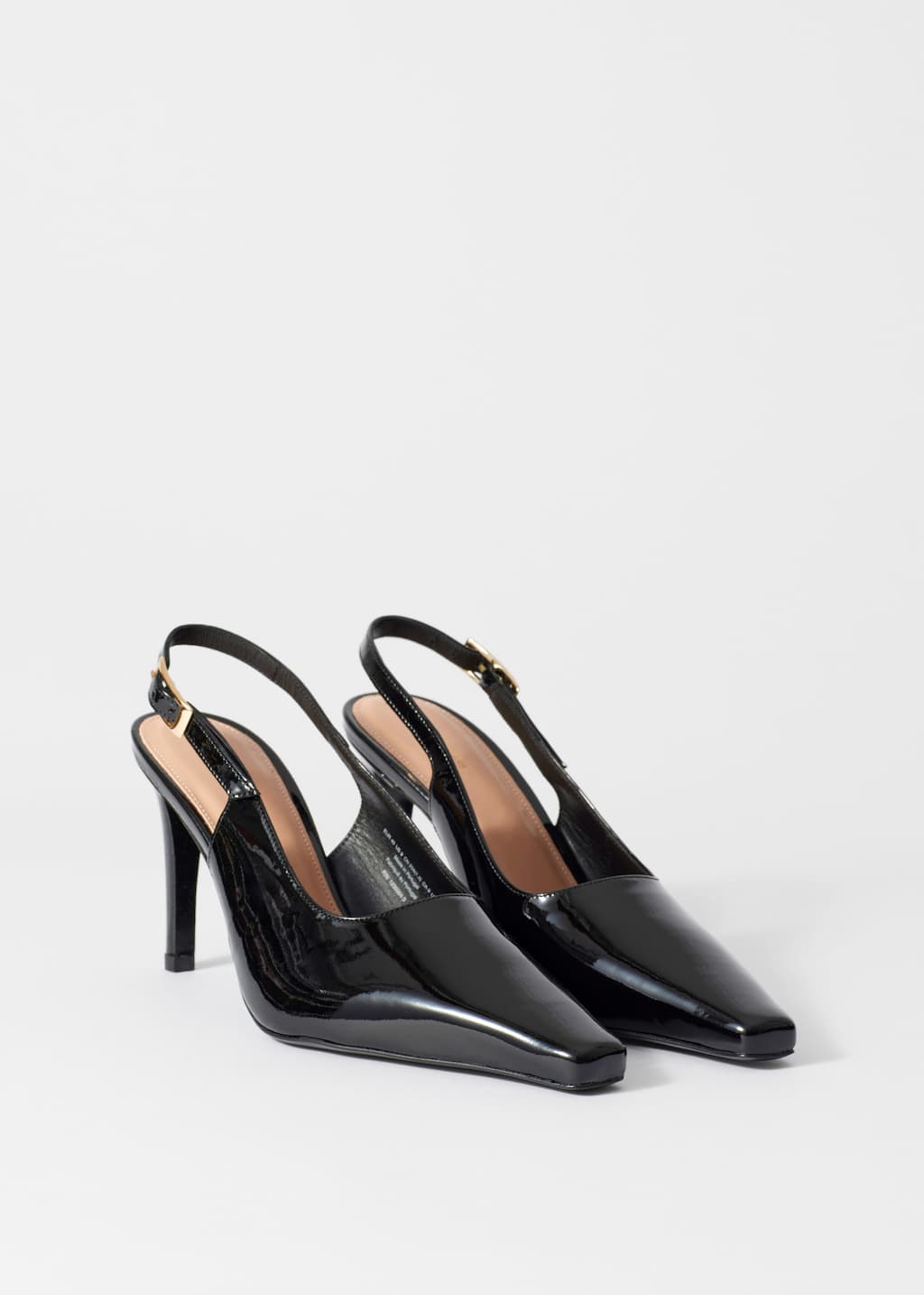 Image of Escarpins à bride arrière en cuir verni