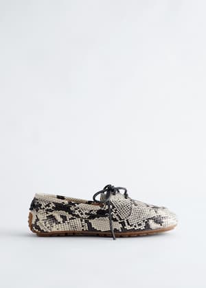 Motif serpent beige clair