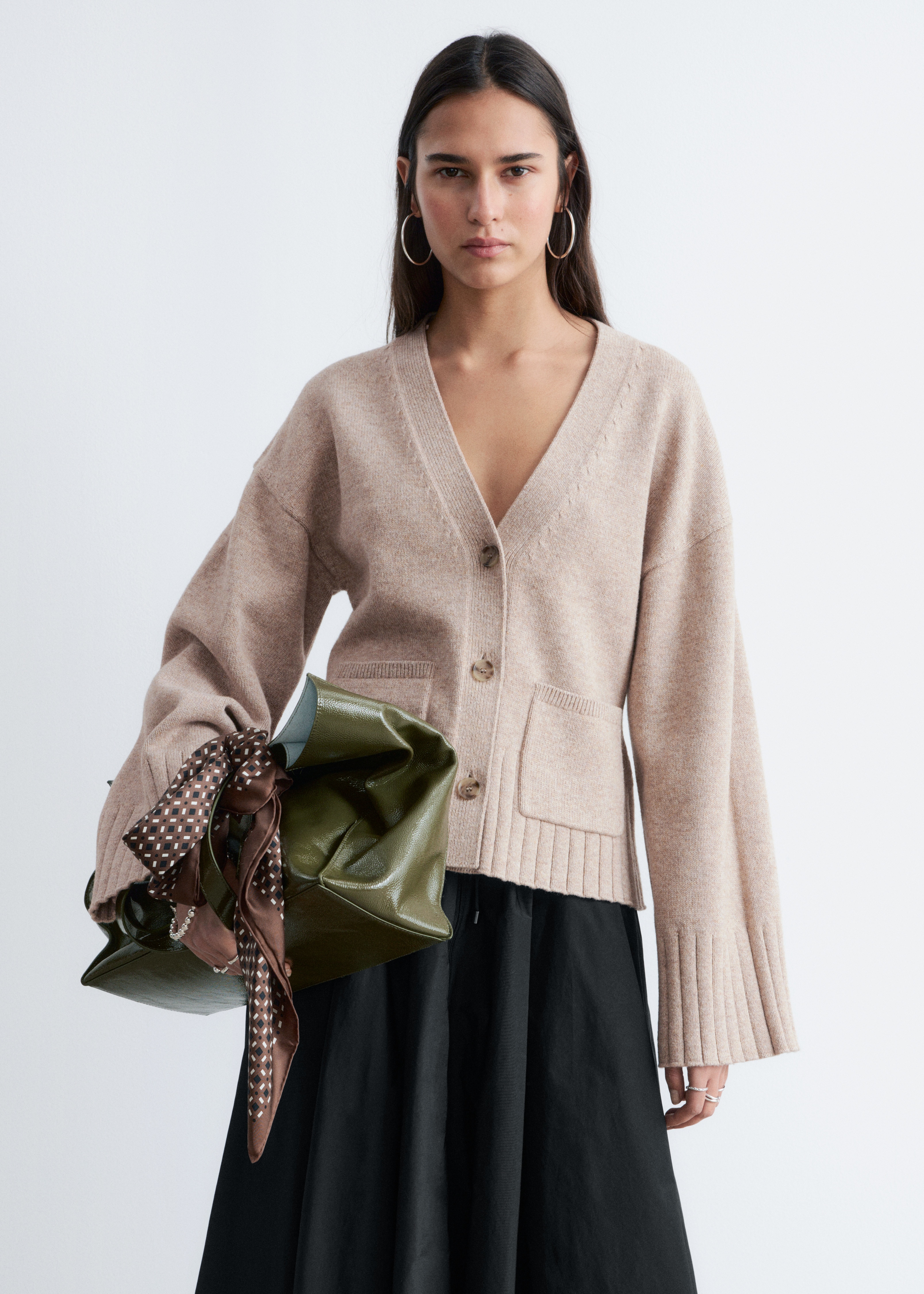 Avsmalnande stickad cardigan - Beige