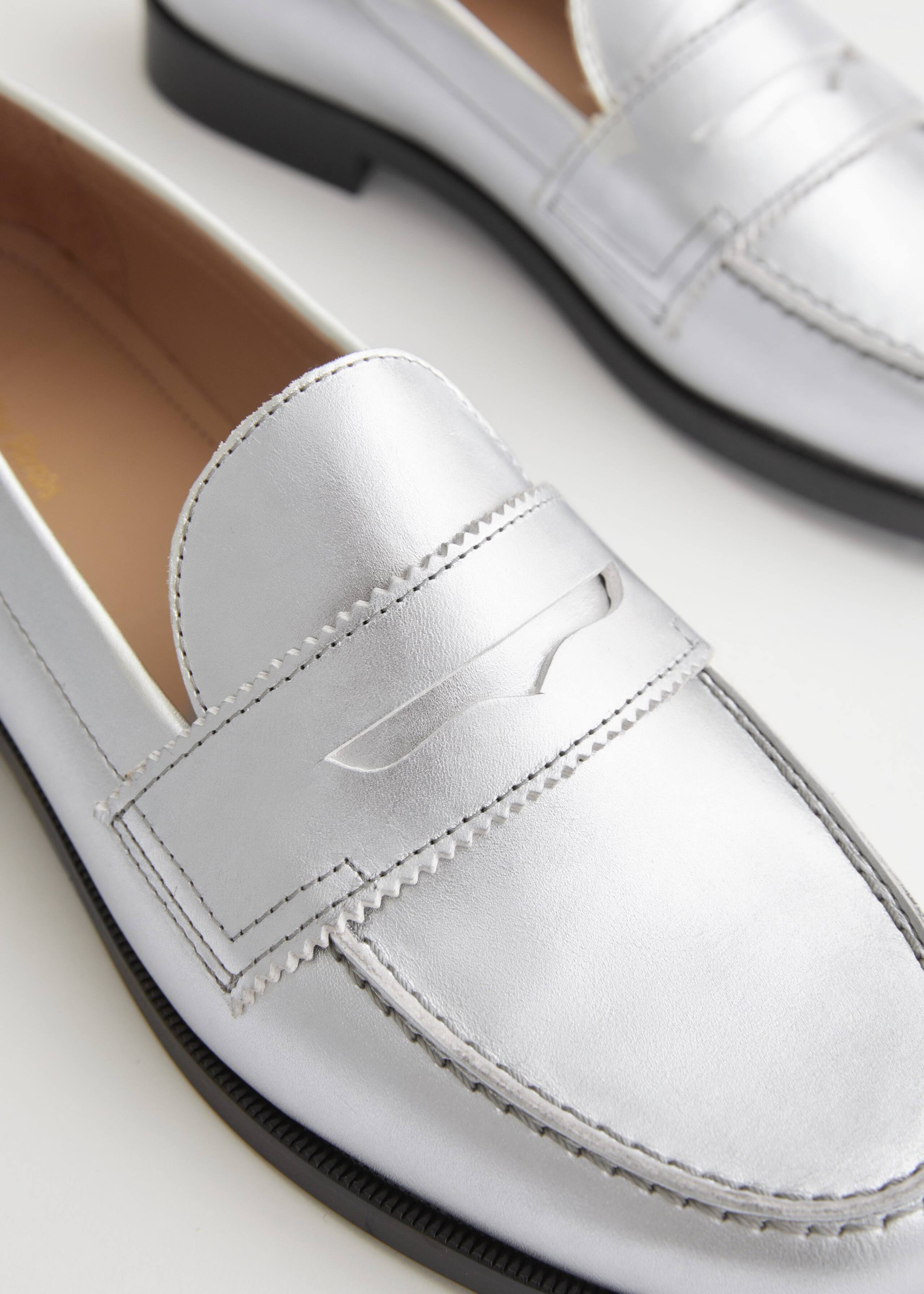 Leather Penny Loafers - {{variantName}} - Descrizione dettagliata