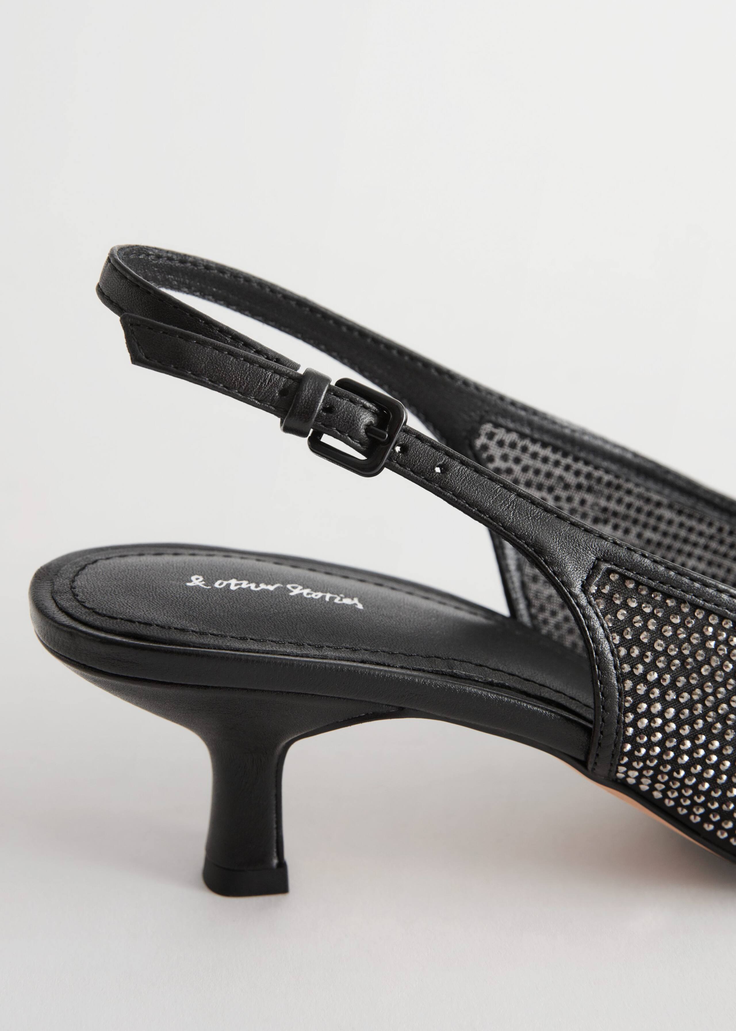 StuddedSlingbackPumps - Black - Natura morta