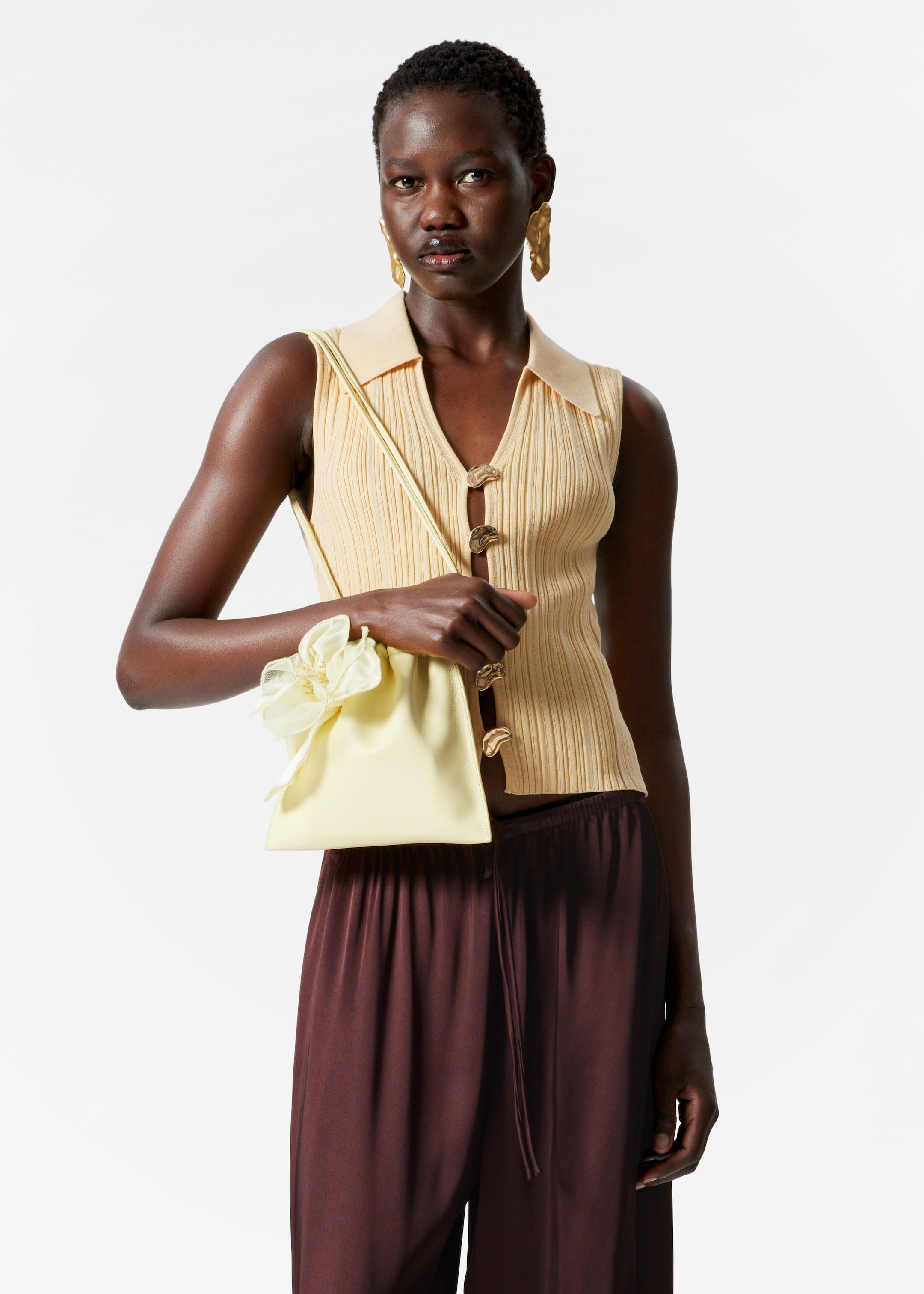 Visa större bild: Ribbstickat linne med krage - Ljusgul - DAM | H&M SE 1