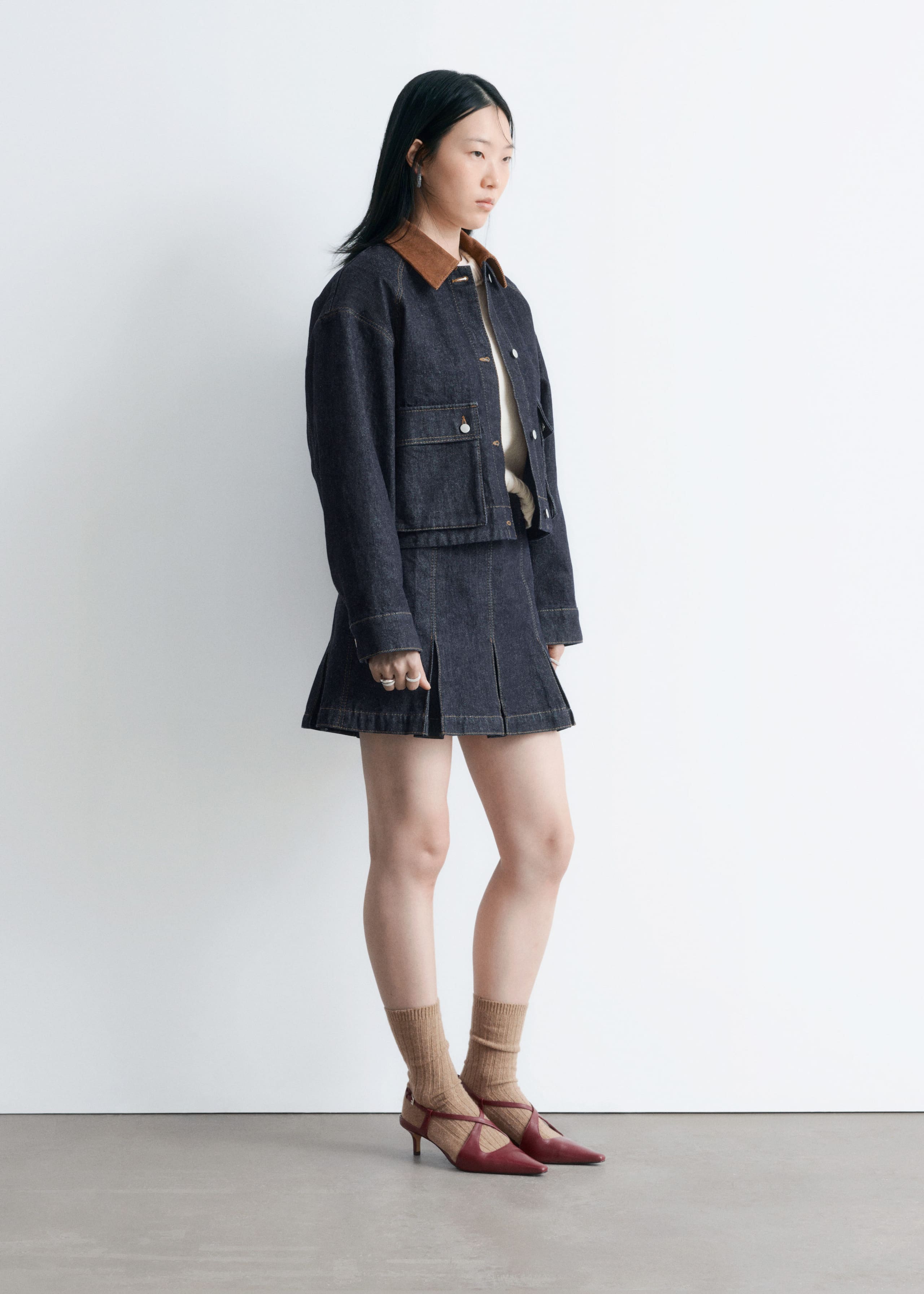 Image of Pleated Denim Mini Skirt