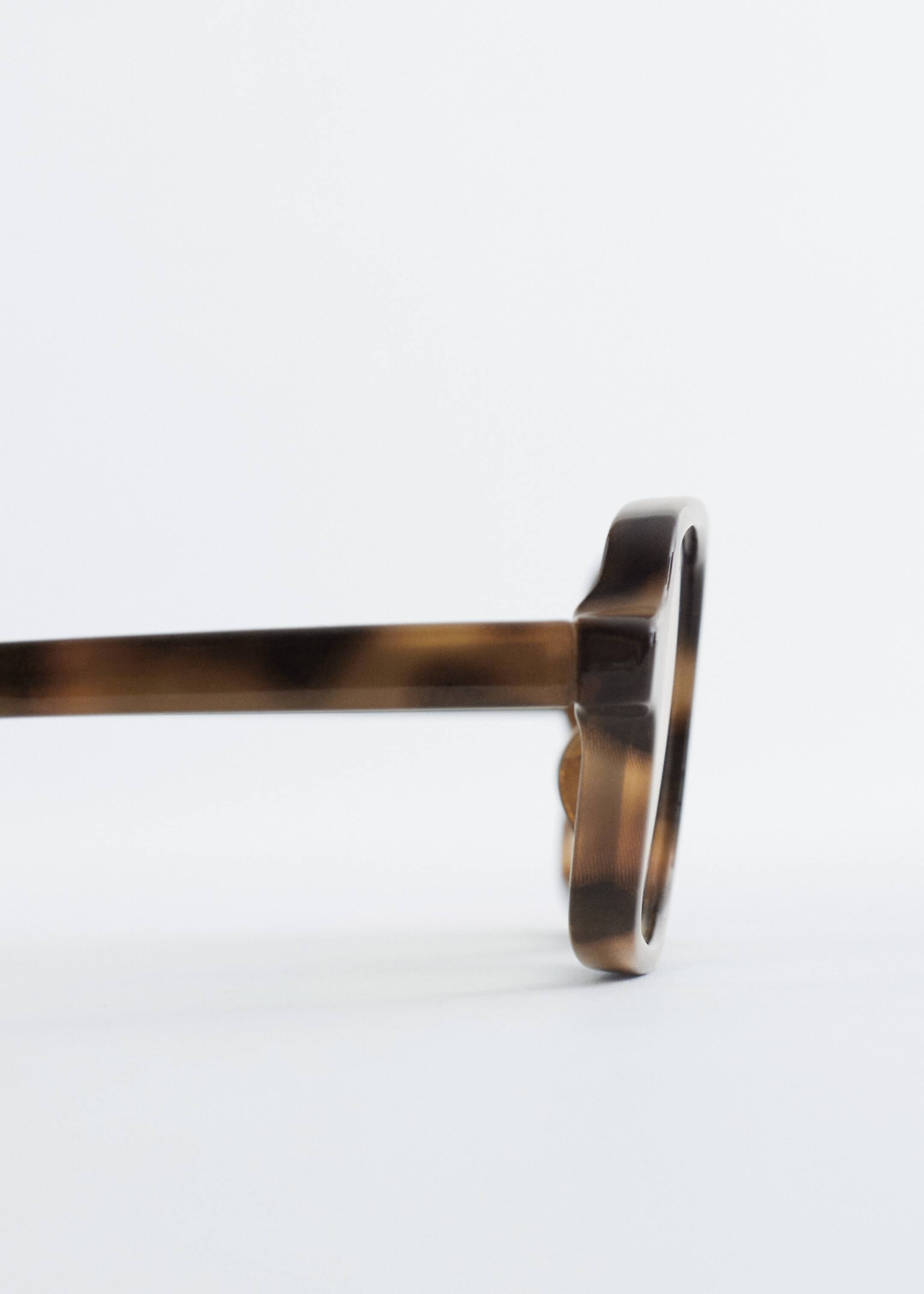 Ingrandisci l'immagine: Elongated Rectangular-Frame Sunglasses - Brown Tortoise/Transparent - DONNA | H&M CH 3