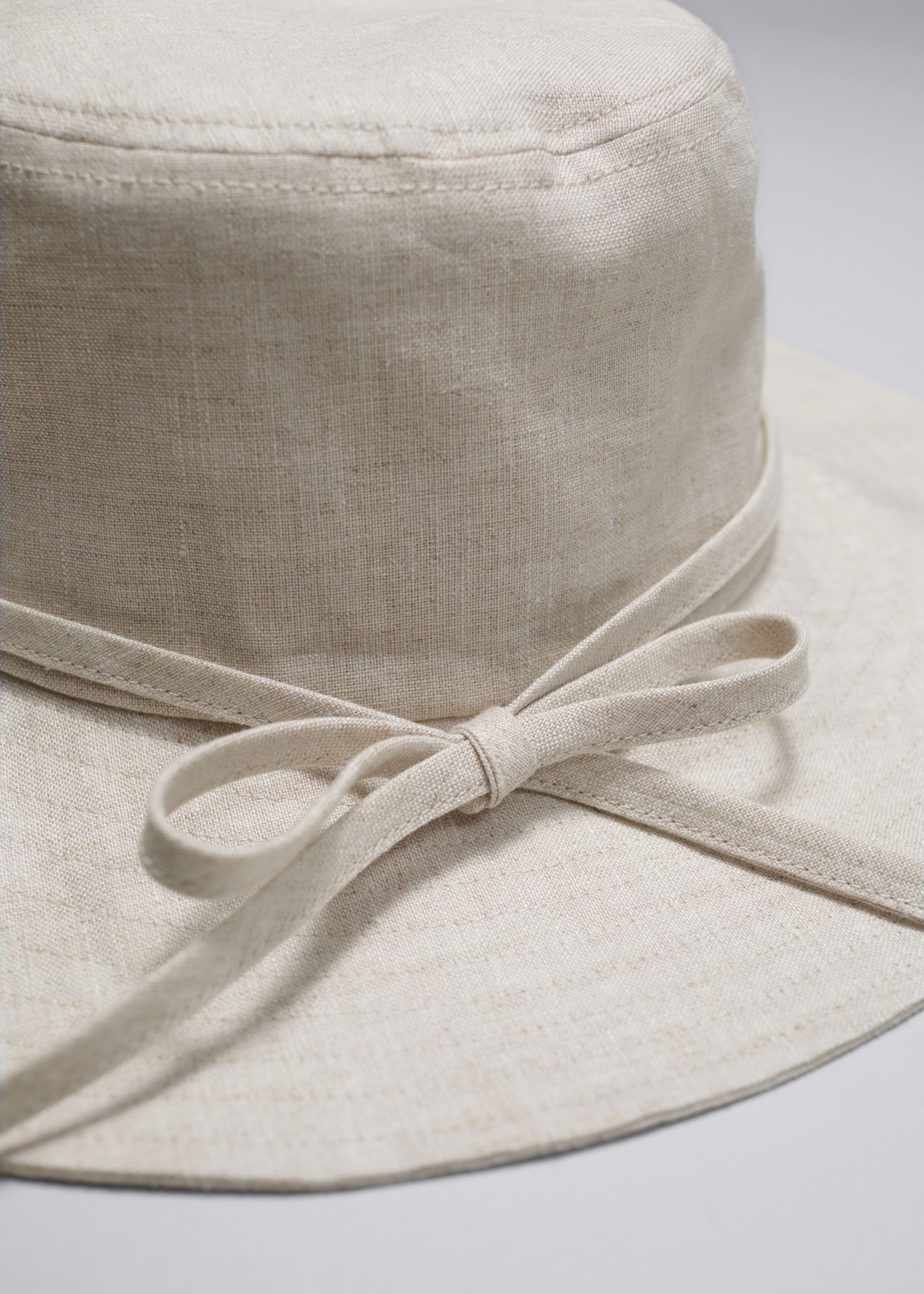Linen Bow Bucket Hat - {{variantName}} - Descriptive Detail