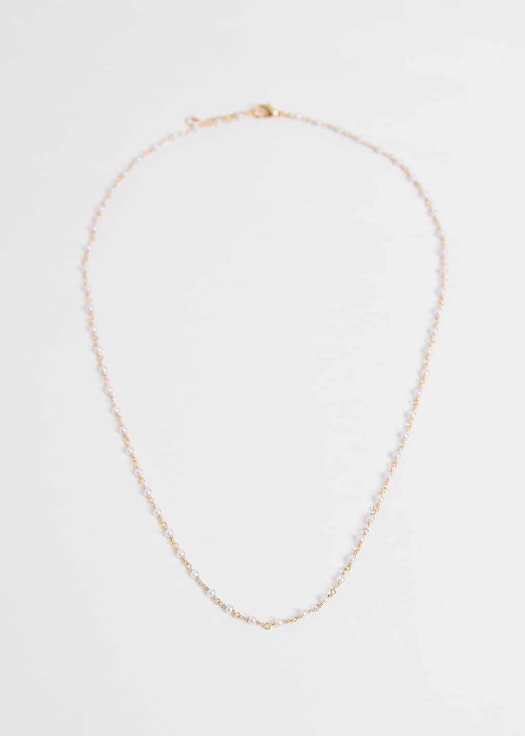 TinyPearlChainNecklace – Złoty/Kość słoniowa – Martwa natura